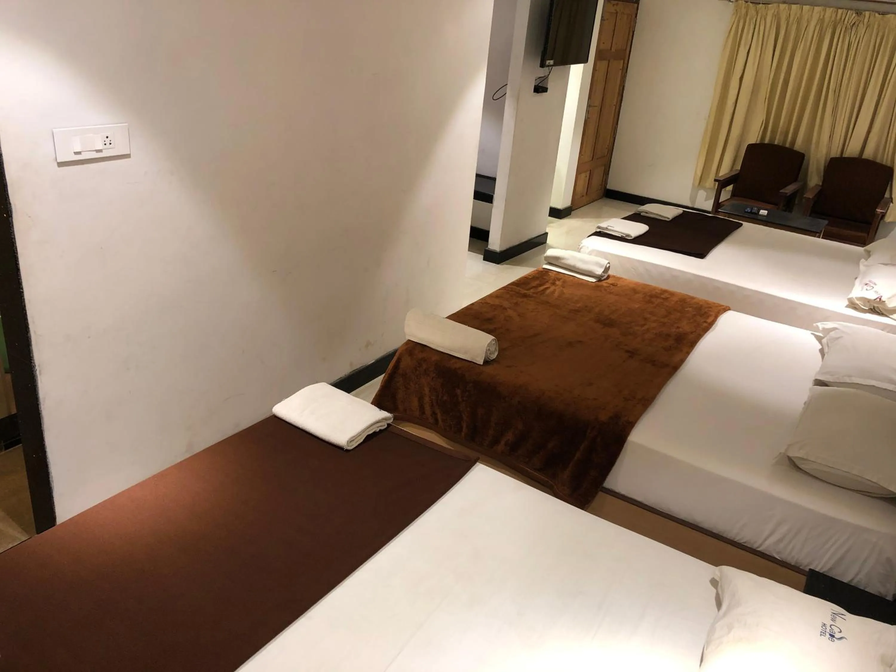 Bed in New Cape Hotel