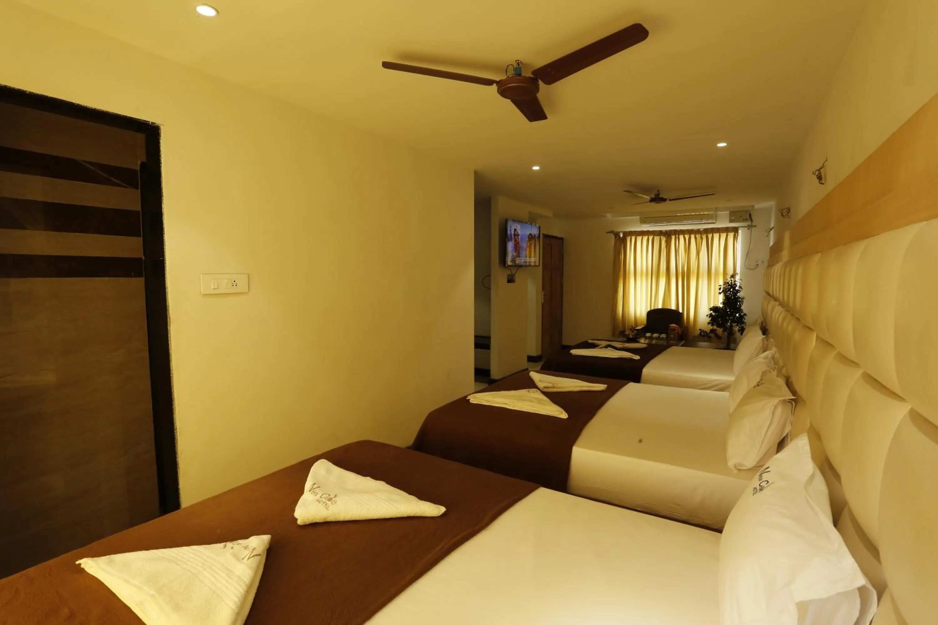 Bed in New Cape Hotel