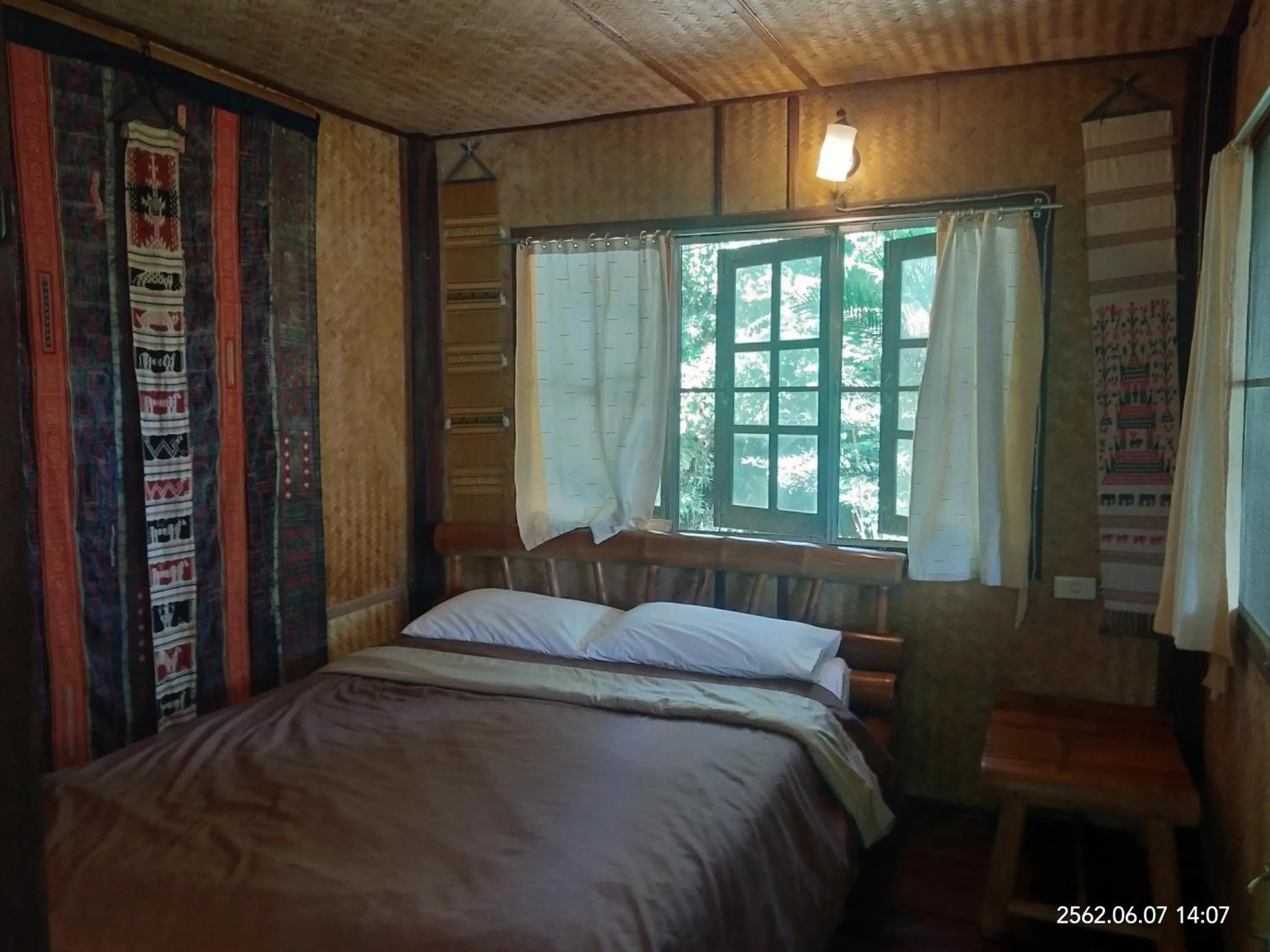 Bed in Baan Suan Jantra Home Stay