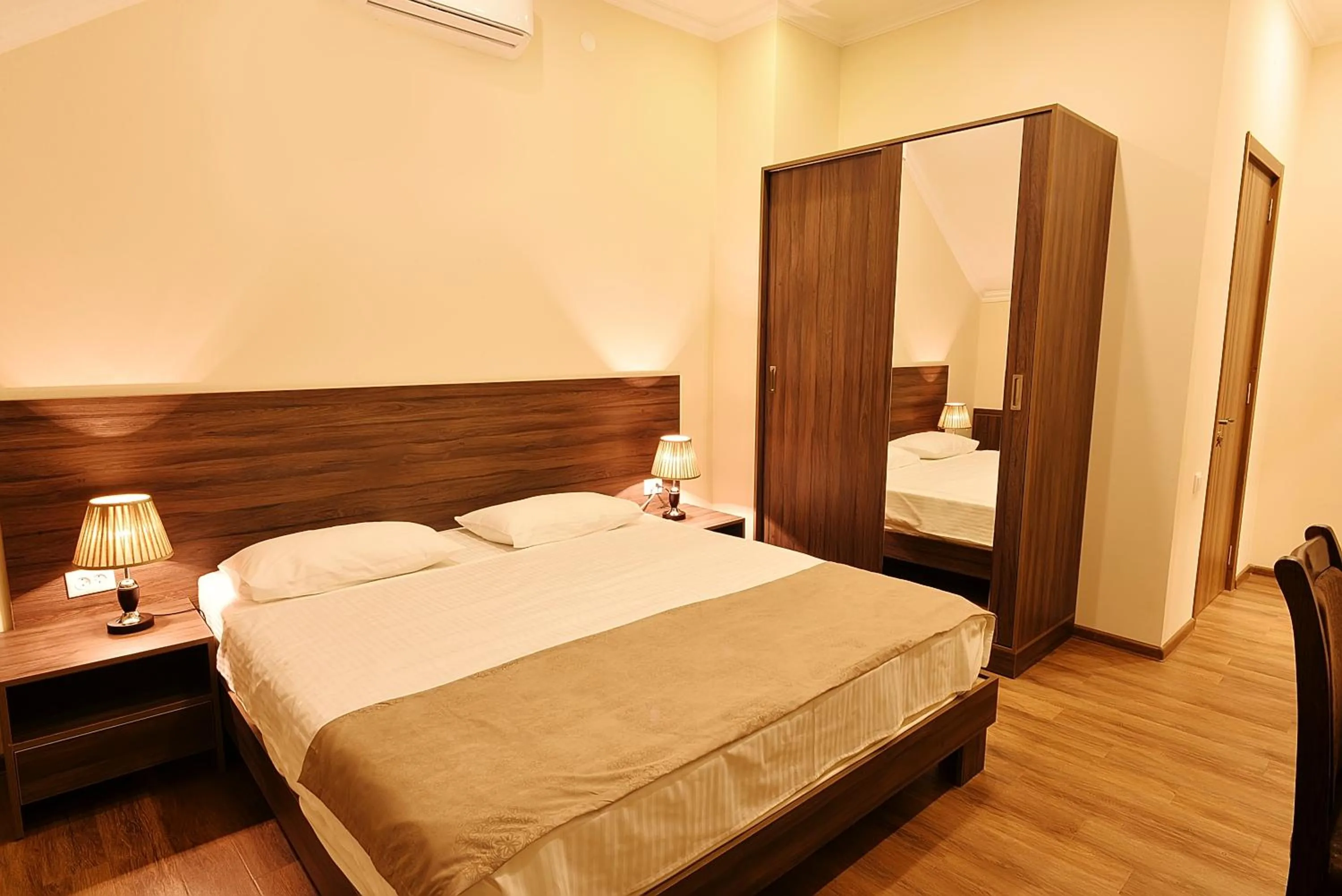 Bedroom, Bed in MGK Hotel