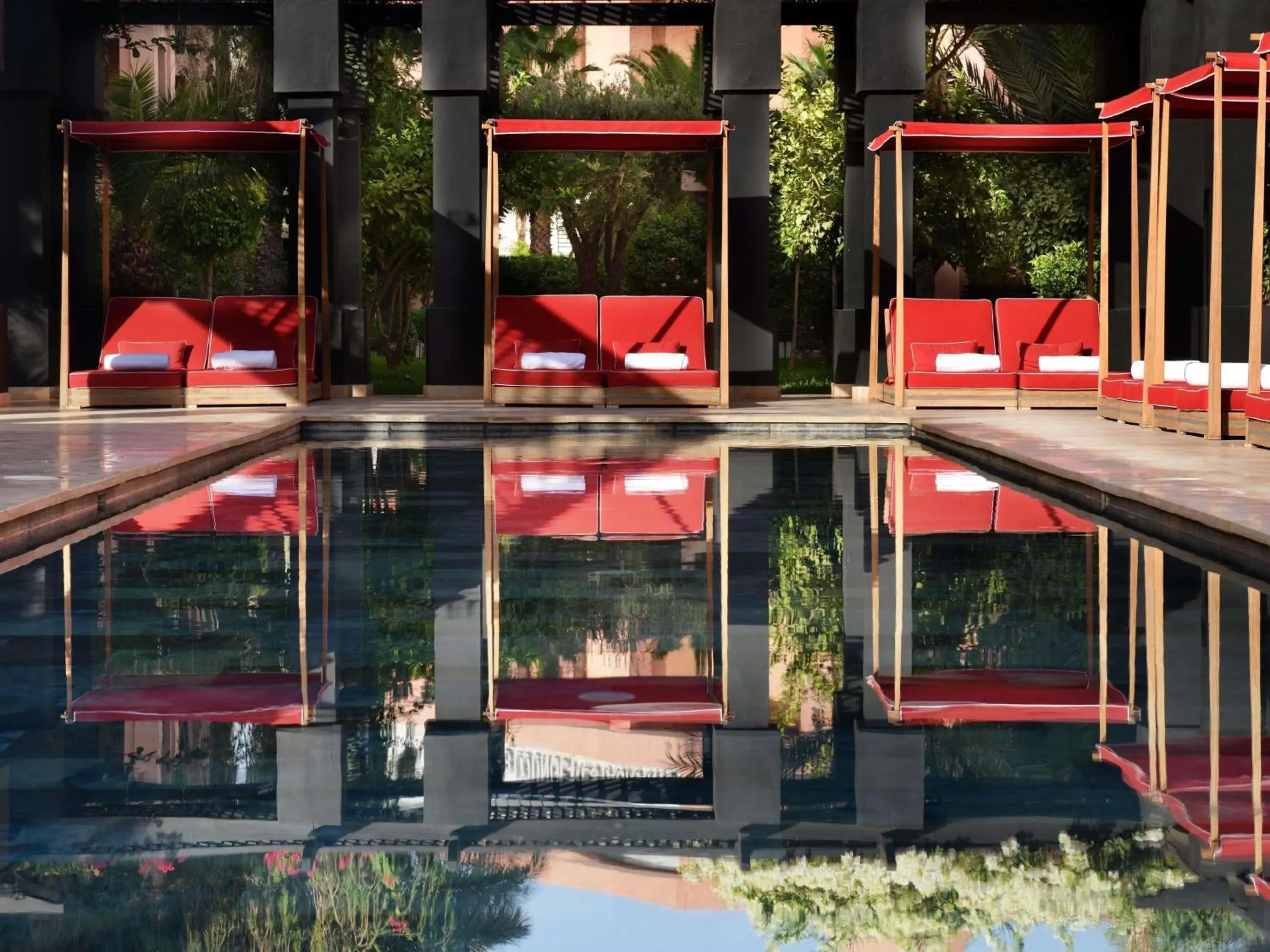 Pool view in Mövenpick Hotel Mansour Eddahbi Marrakech Pool view in Mövenpick Hotel Mansour Eddahbi Marrakech