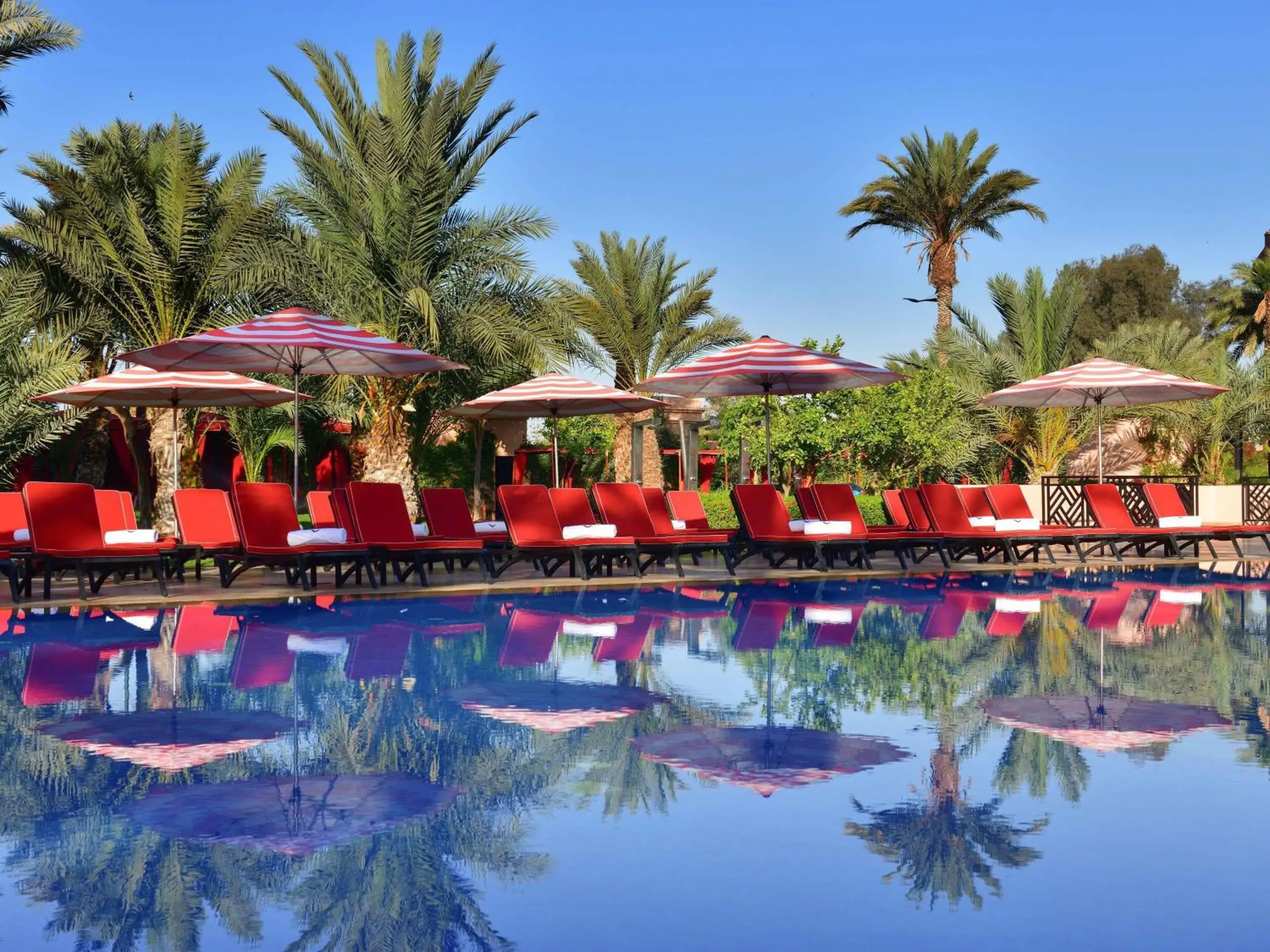 Pool view in Mövenpick Hotel Mansour Eddahbi Marrakech Pool view in Mövenpick Hotel Mansour Eddahbi Marrakech