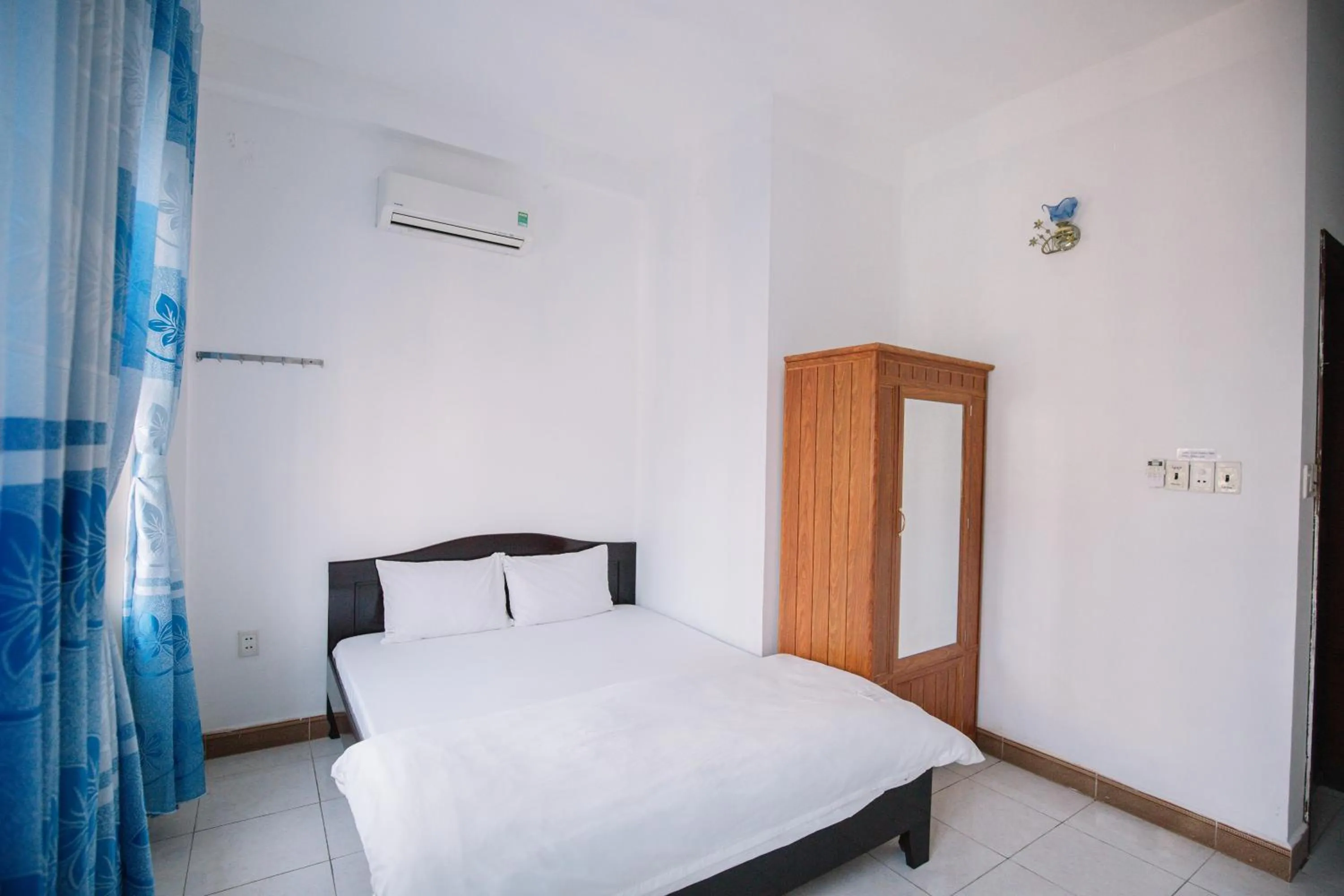 Bedroom in Lum Dong Tien Hotel