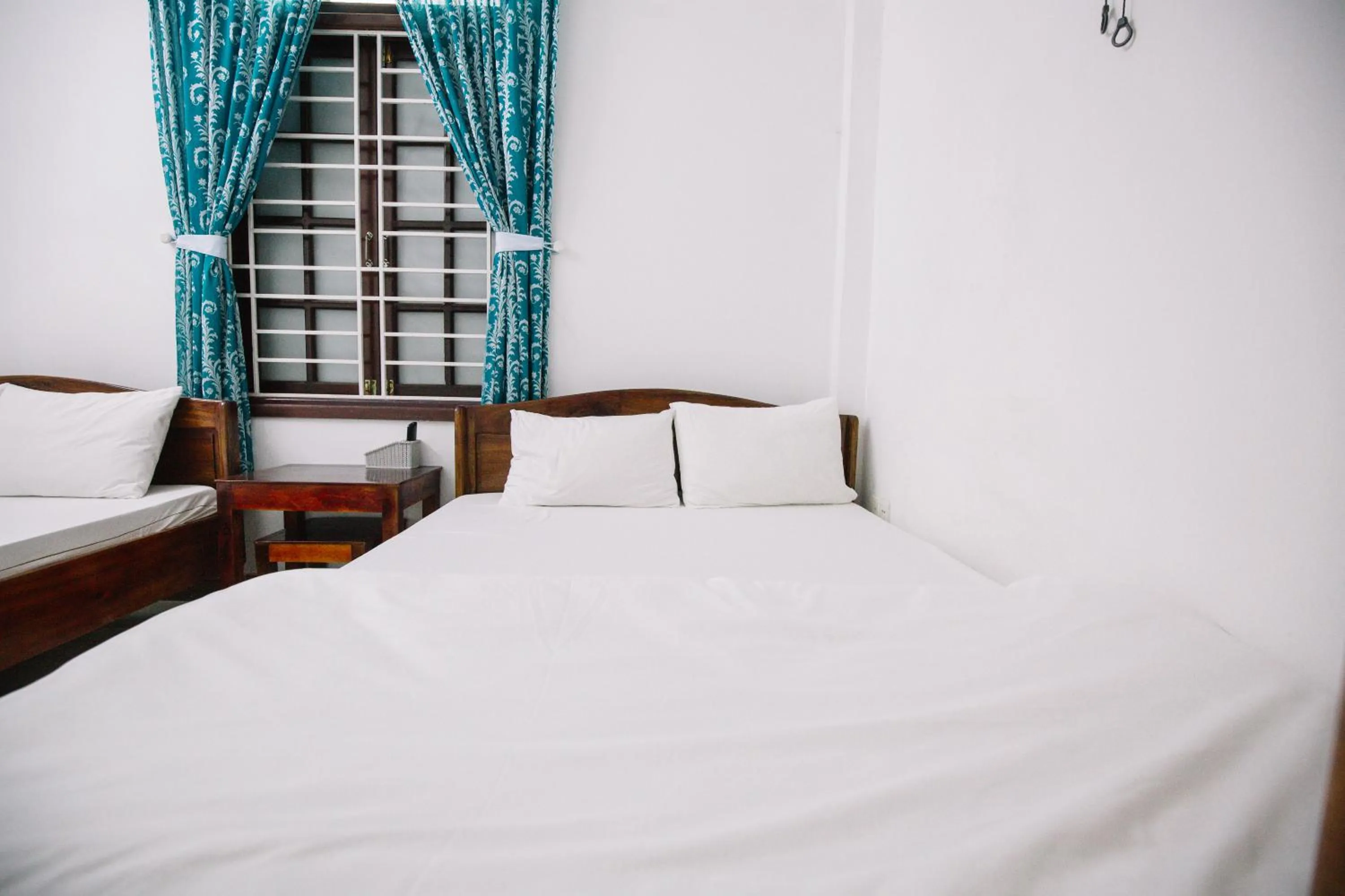 Bed in Lum Dong Tien Hotel