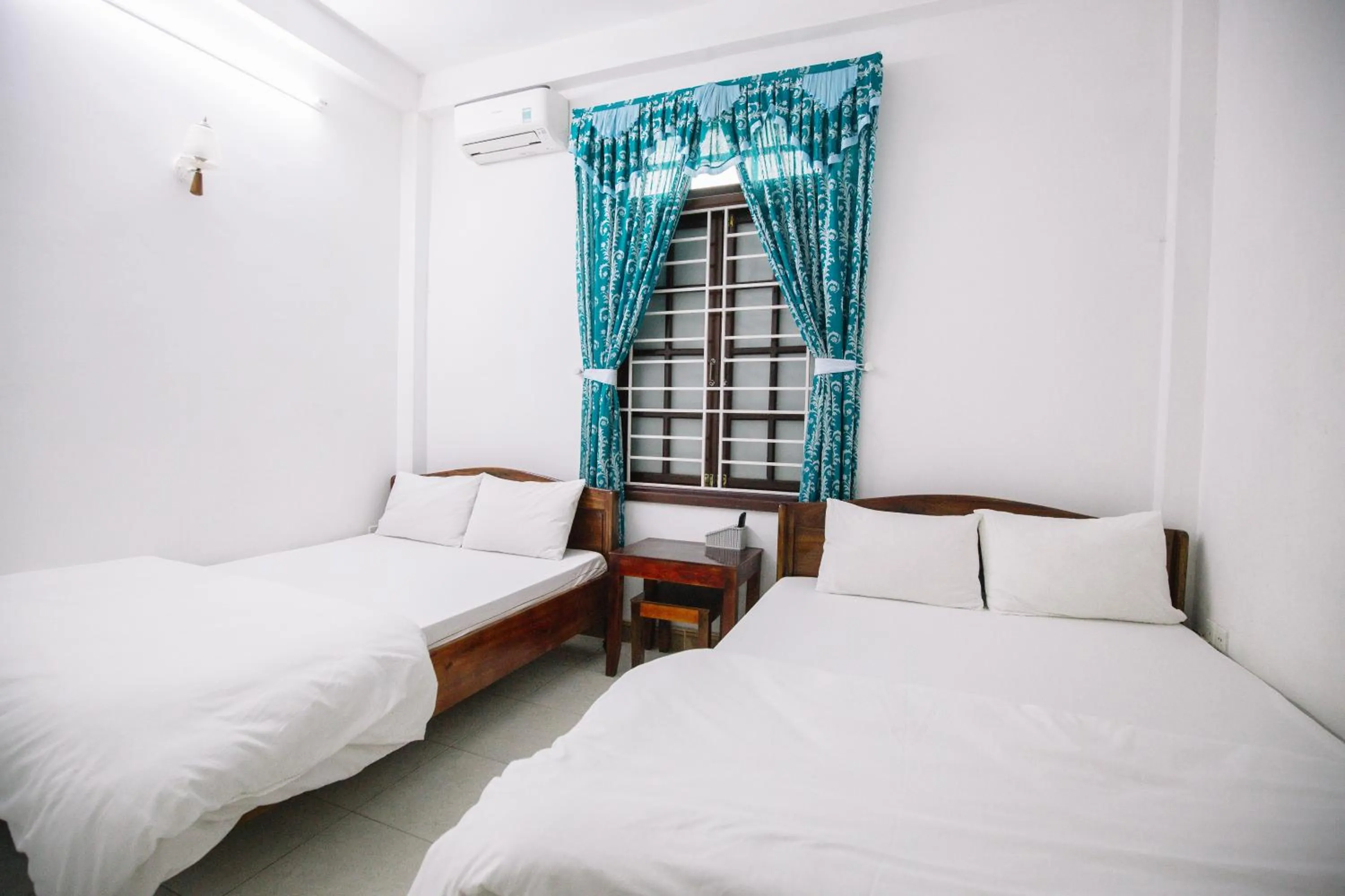 Bedroom in Lum Dong Tien Hotel