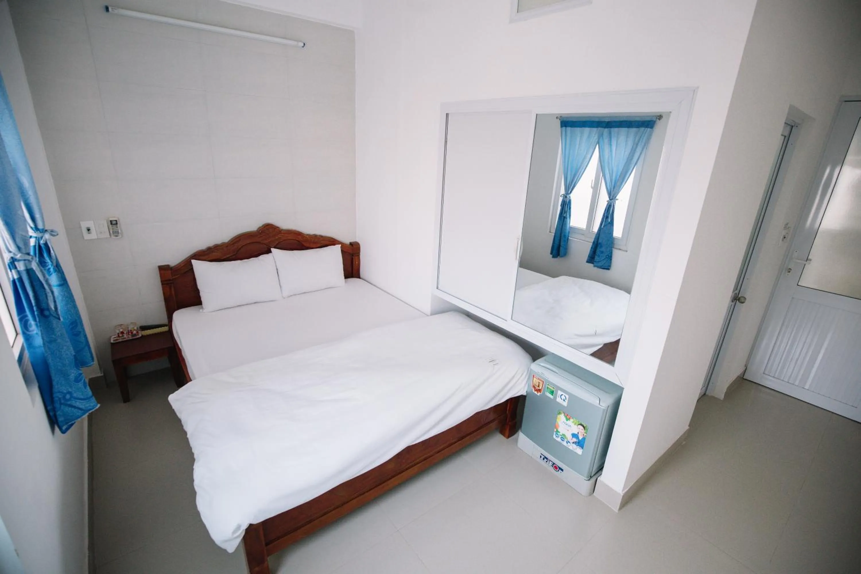 Bedroom in Lum Dong Tien Hotel