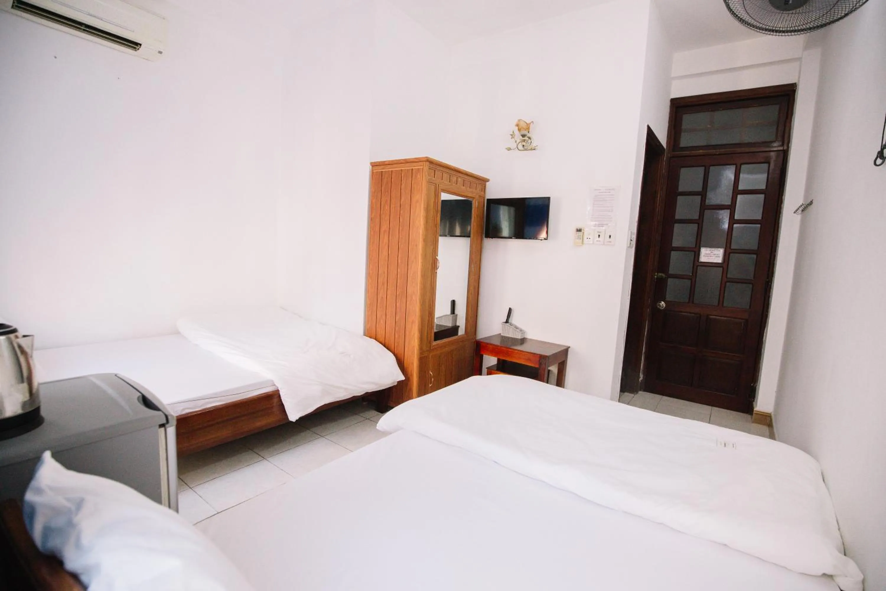 Bedroom in Lum Dong Tien Hotel