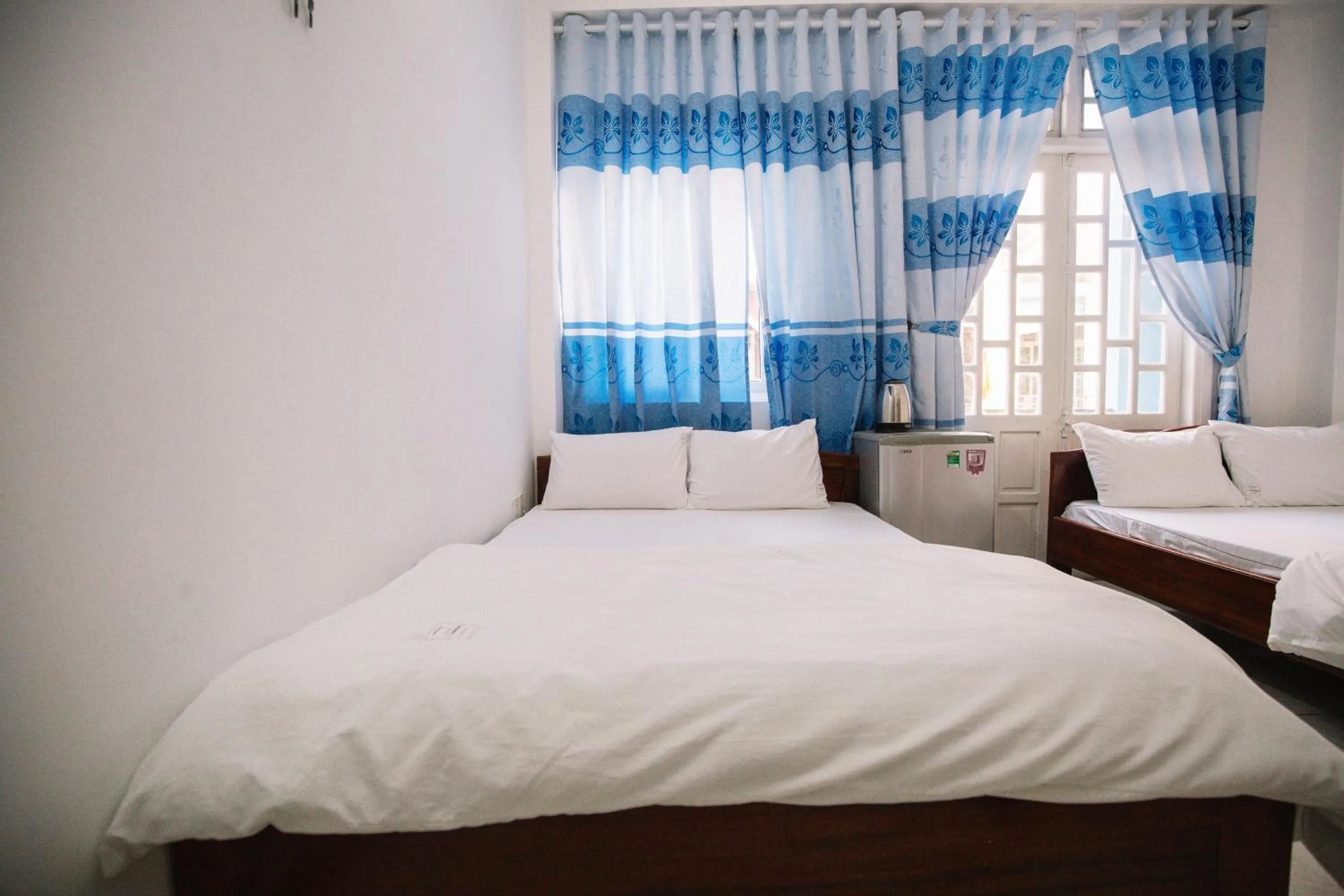 Bedroom in Lum Dong Tien Hotel