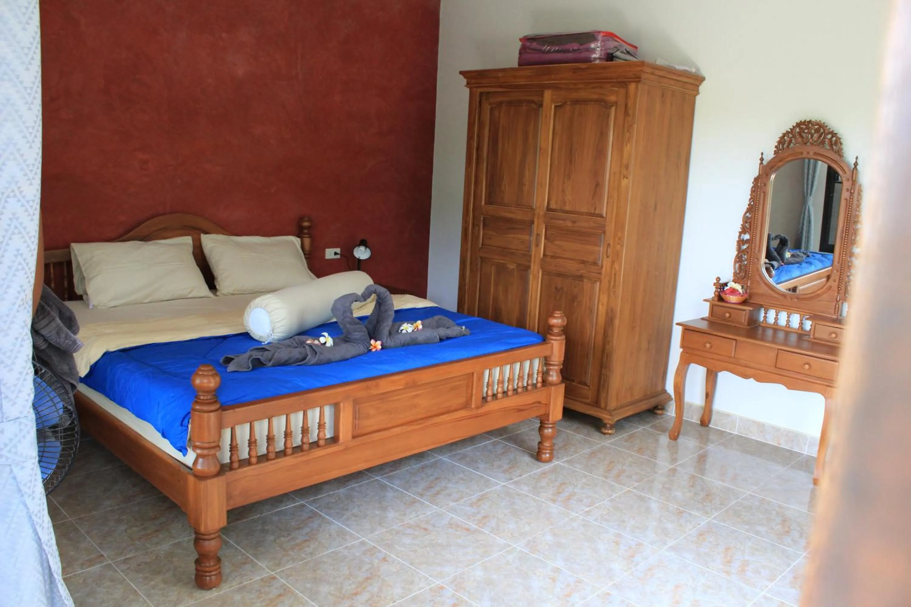 Photo of the whole room, Bed in Nananuira Apartment and Room