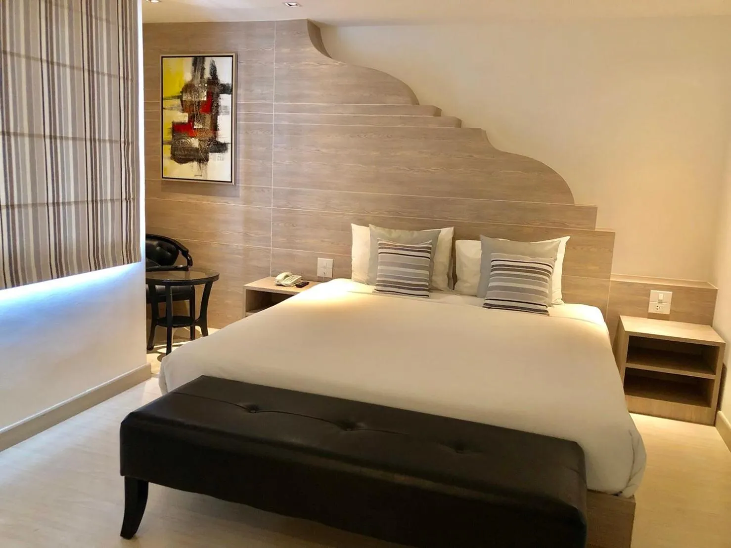 Bed in Methavalai Residence Hotel