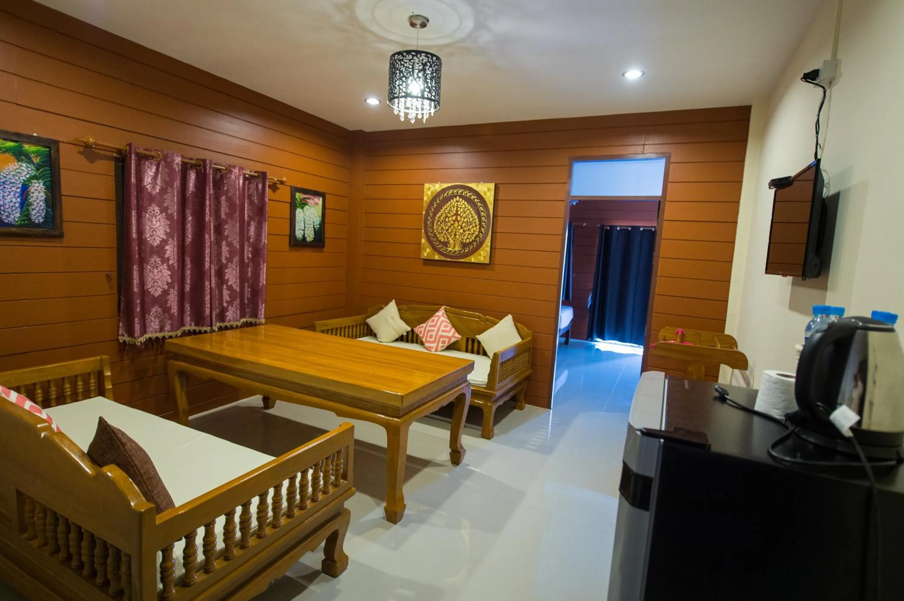 Living room in Sri Siam Resort