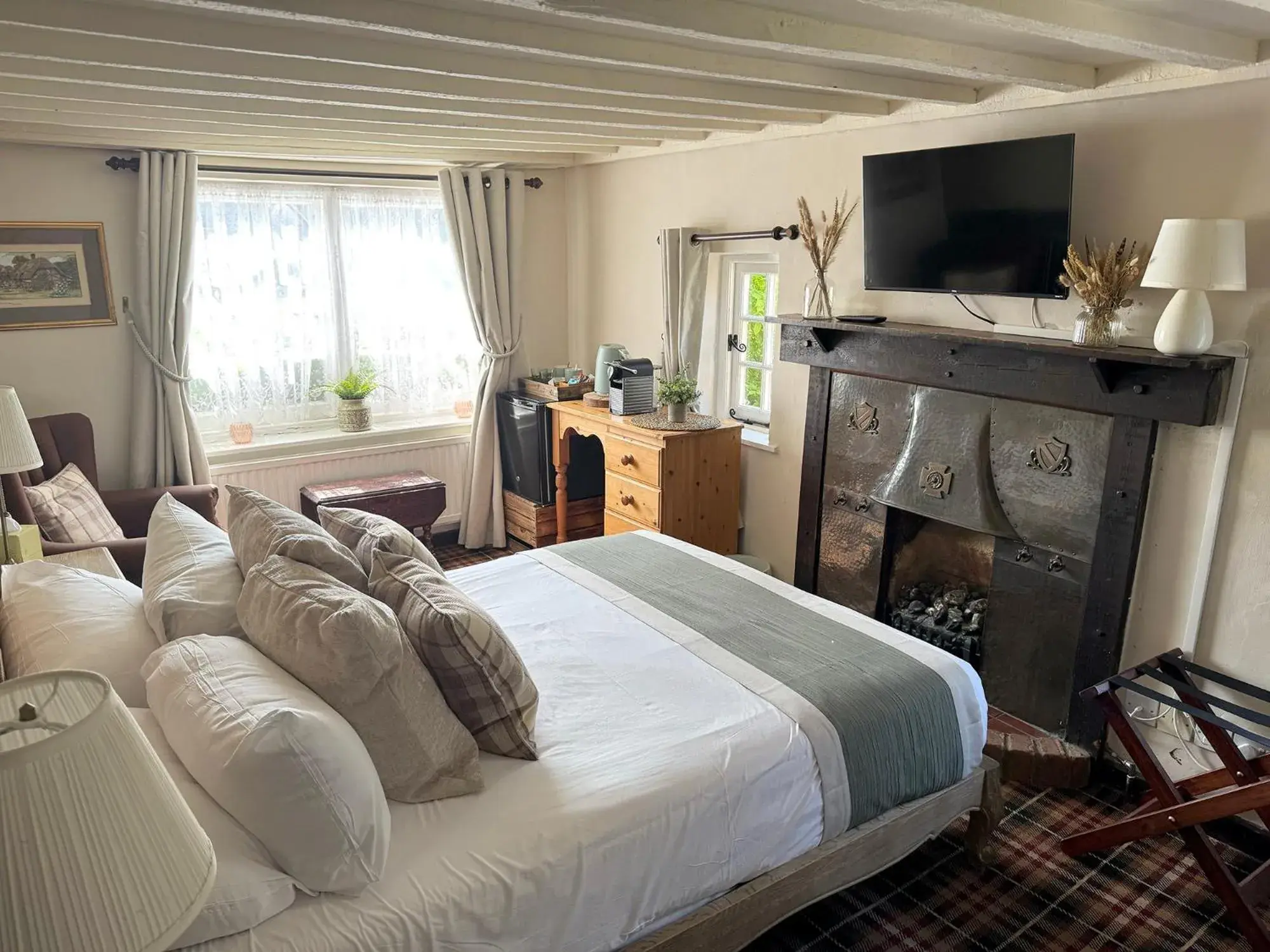 Bed in Thatched Cottage Hotel Bed in Thatched Cottage Hotel