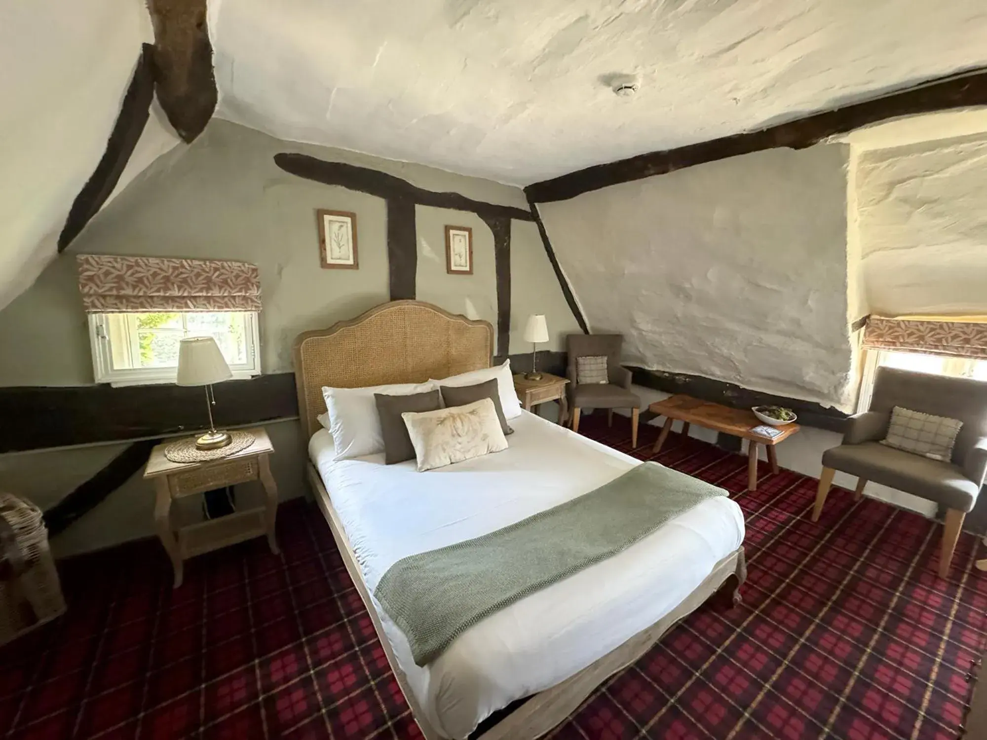 Bed in Thatched Cottage Hotel Bed in Thatched Cottage Hotel