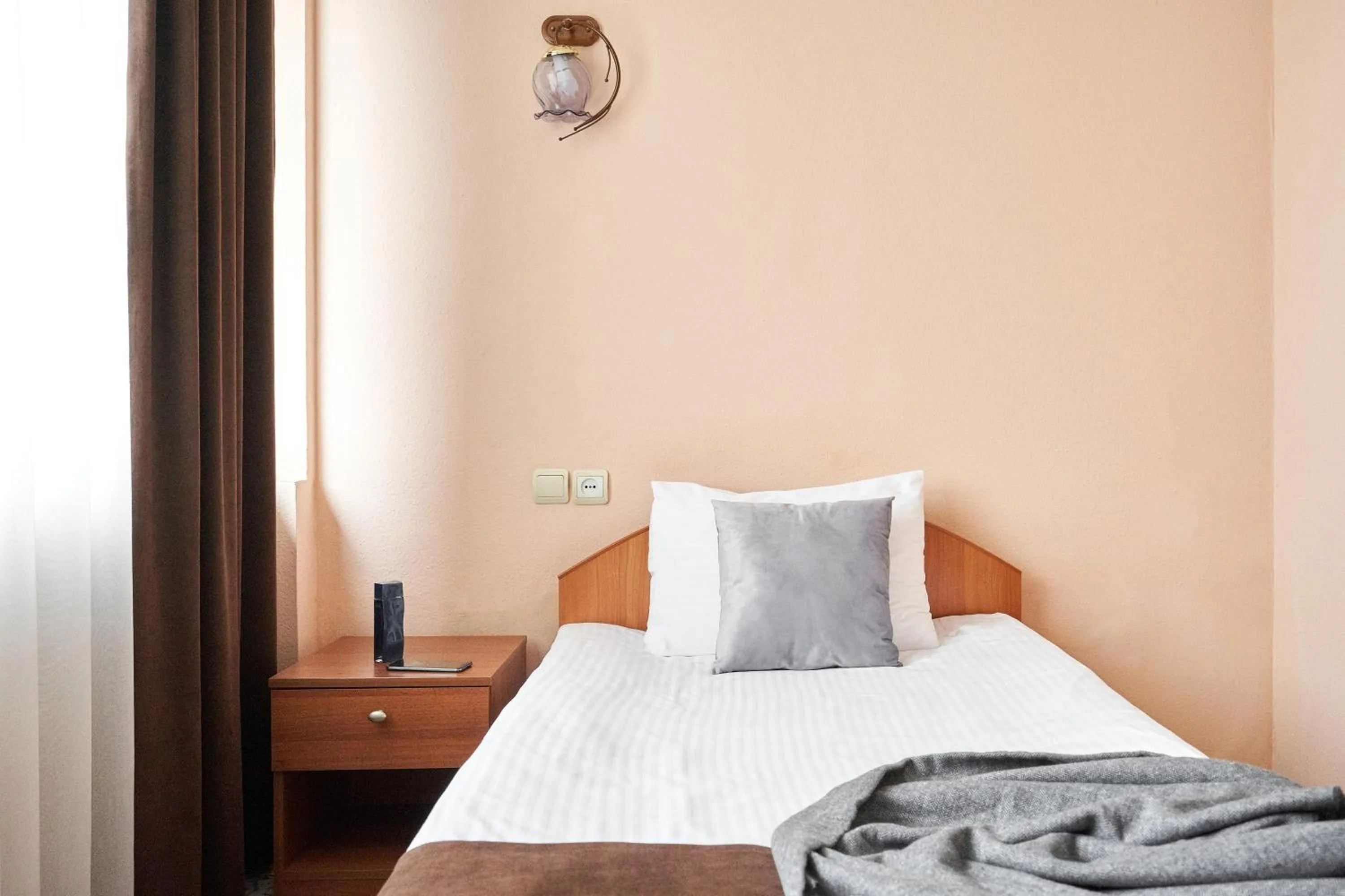 Bed in Hotel Druzhba