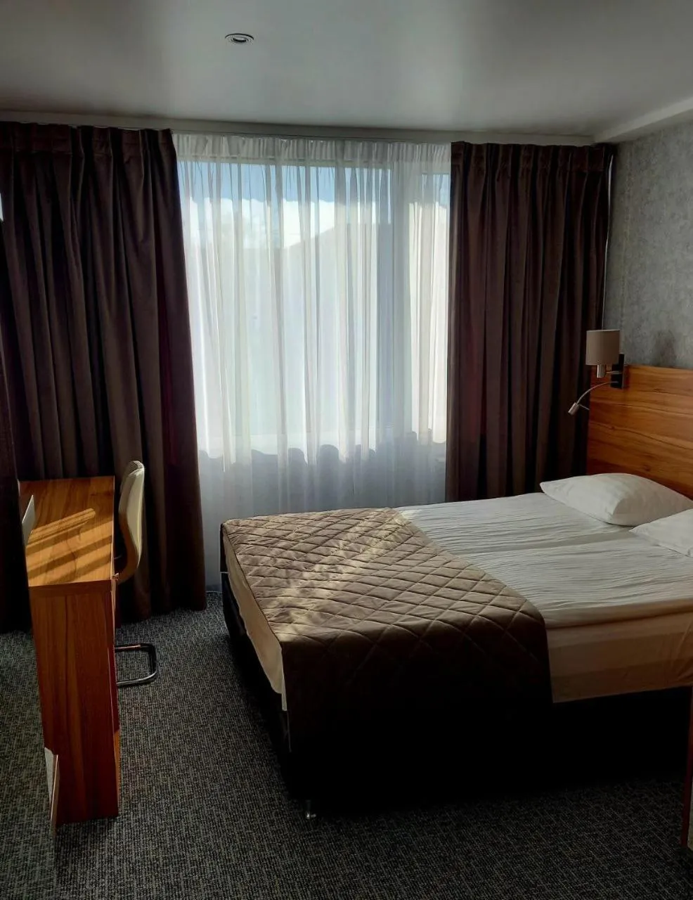 Bed in Hotel Druzhba