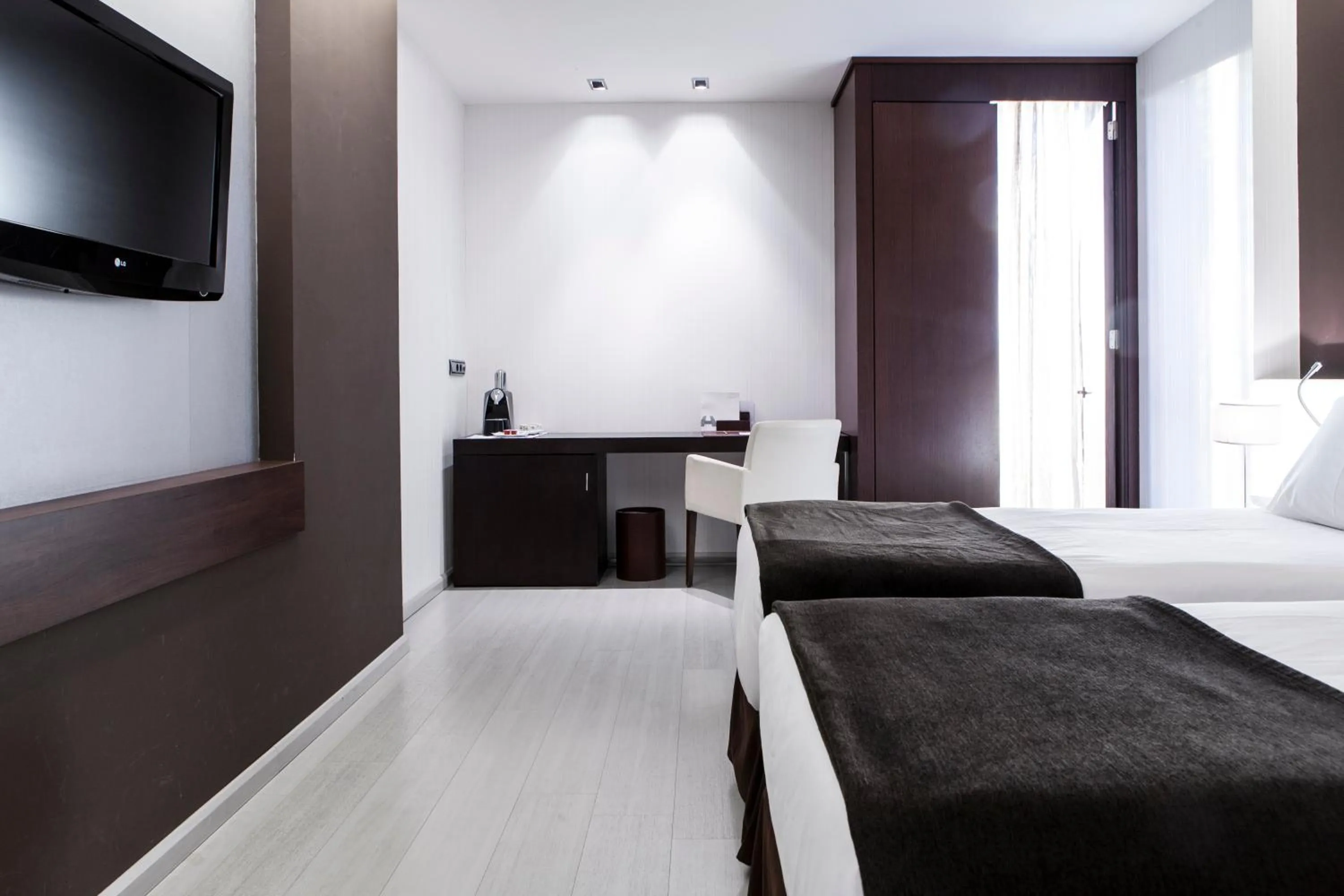 Bed in Hotel Diagonal Plaza