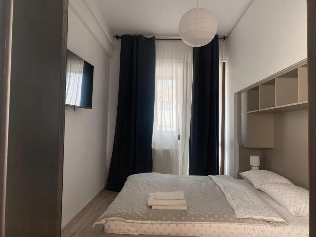 Bed in Palace Central Suites