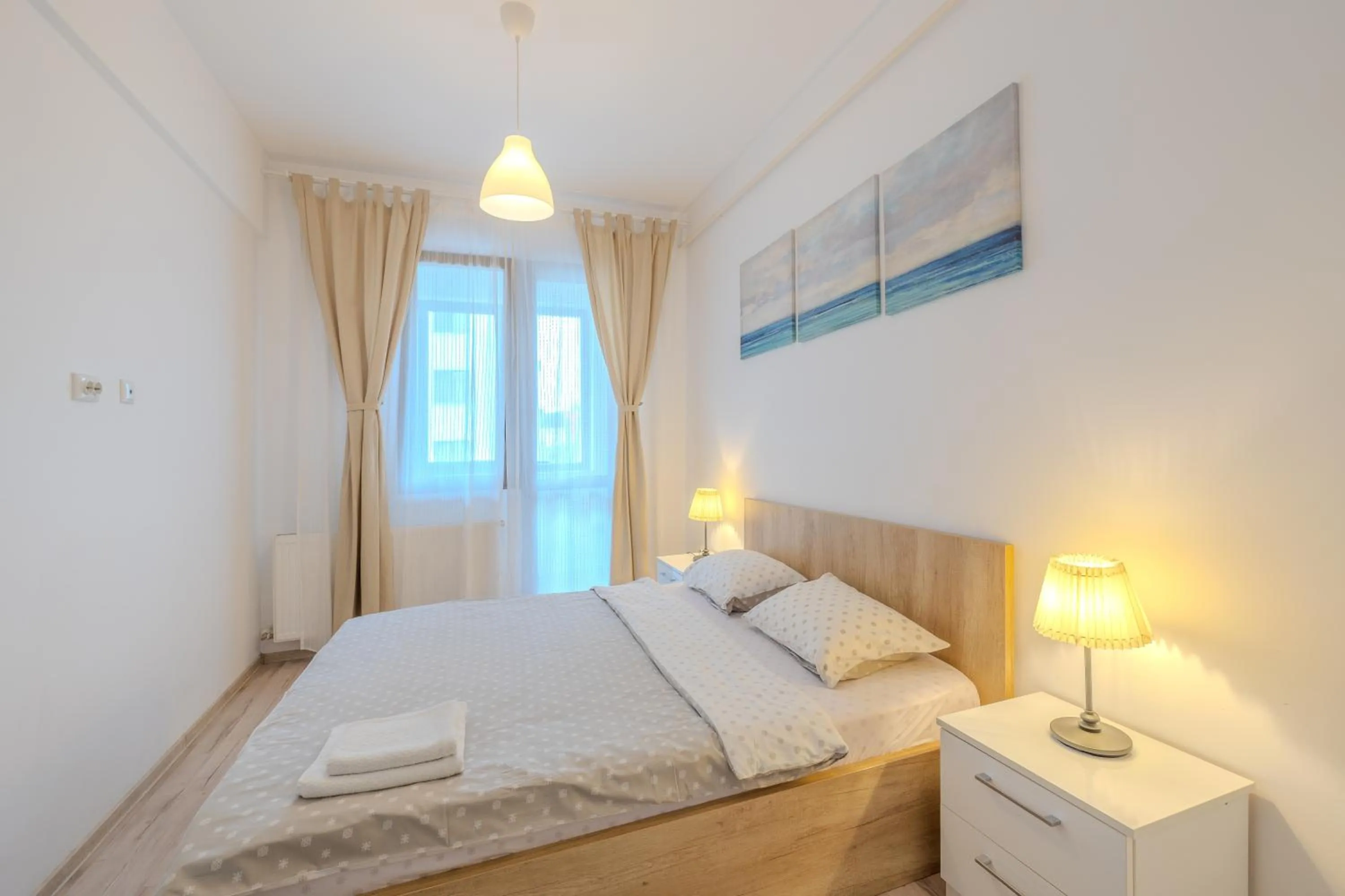 Bed in Palace Central Suites