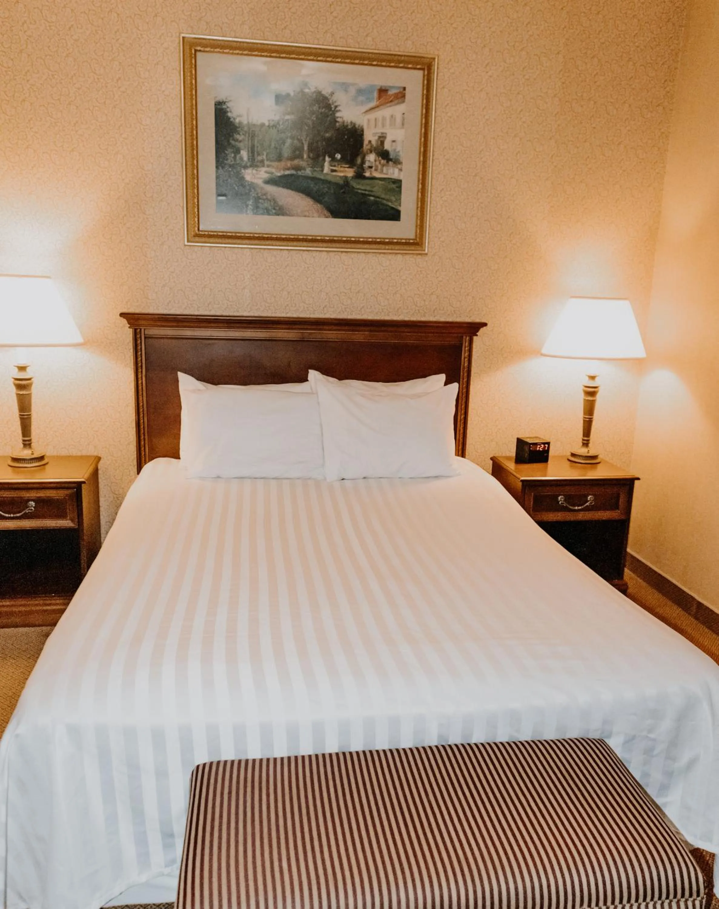 Bed in Carriage House Country Club