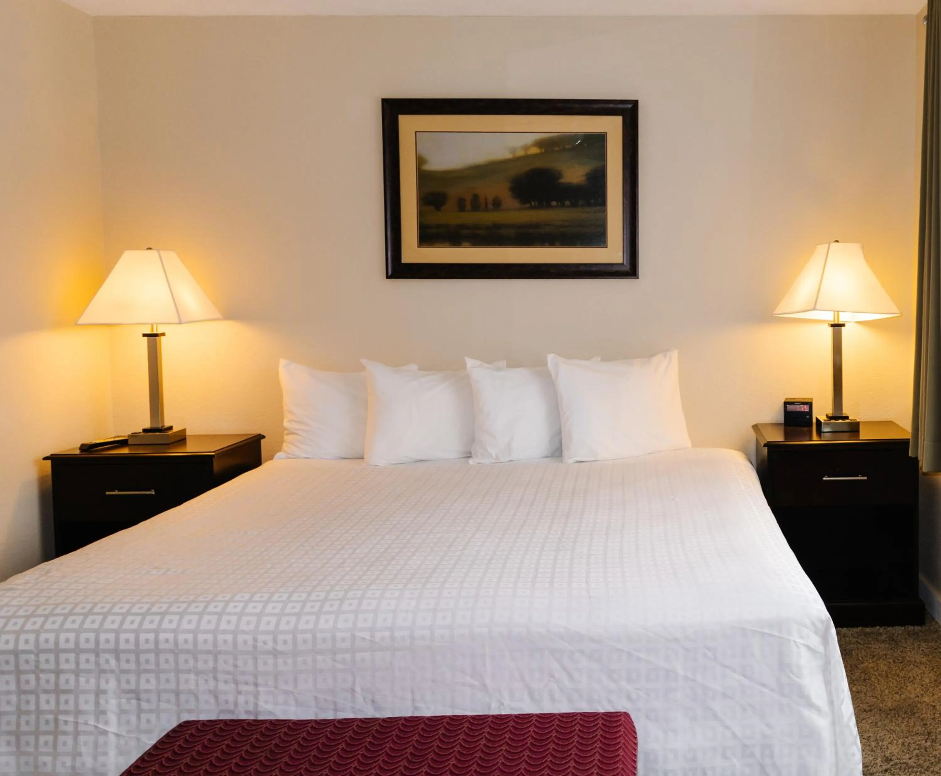 Bed in Carriage House Country Club