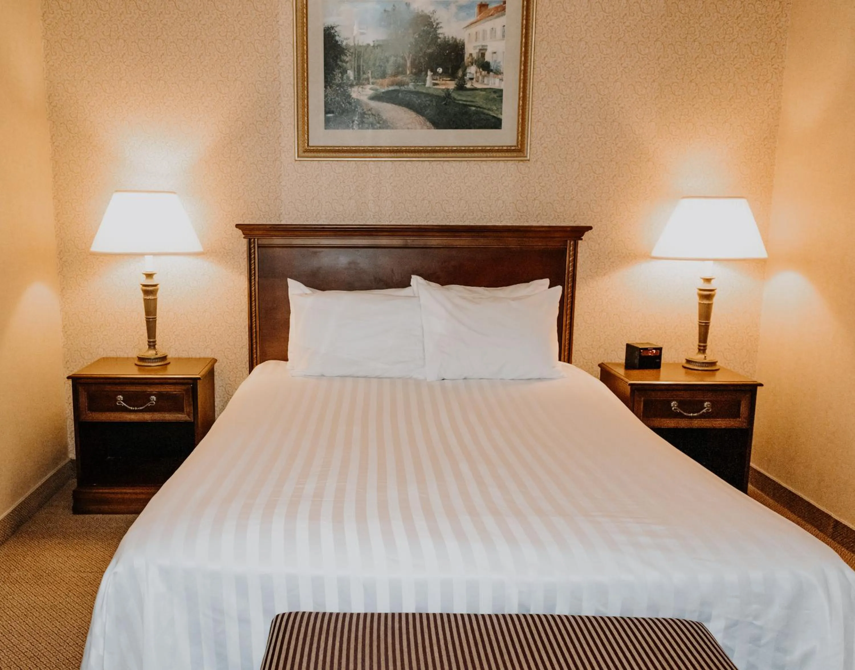 Bed in Carriage House Country Club