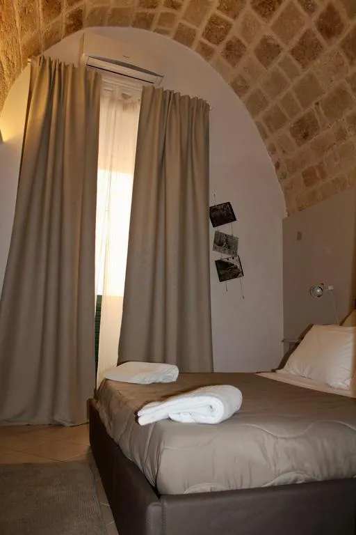 Photo of the whole room, Bed in Palazzo Kapece