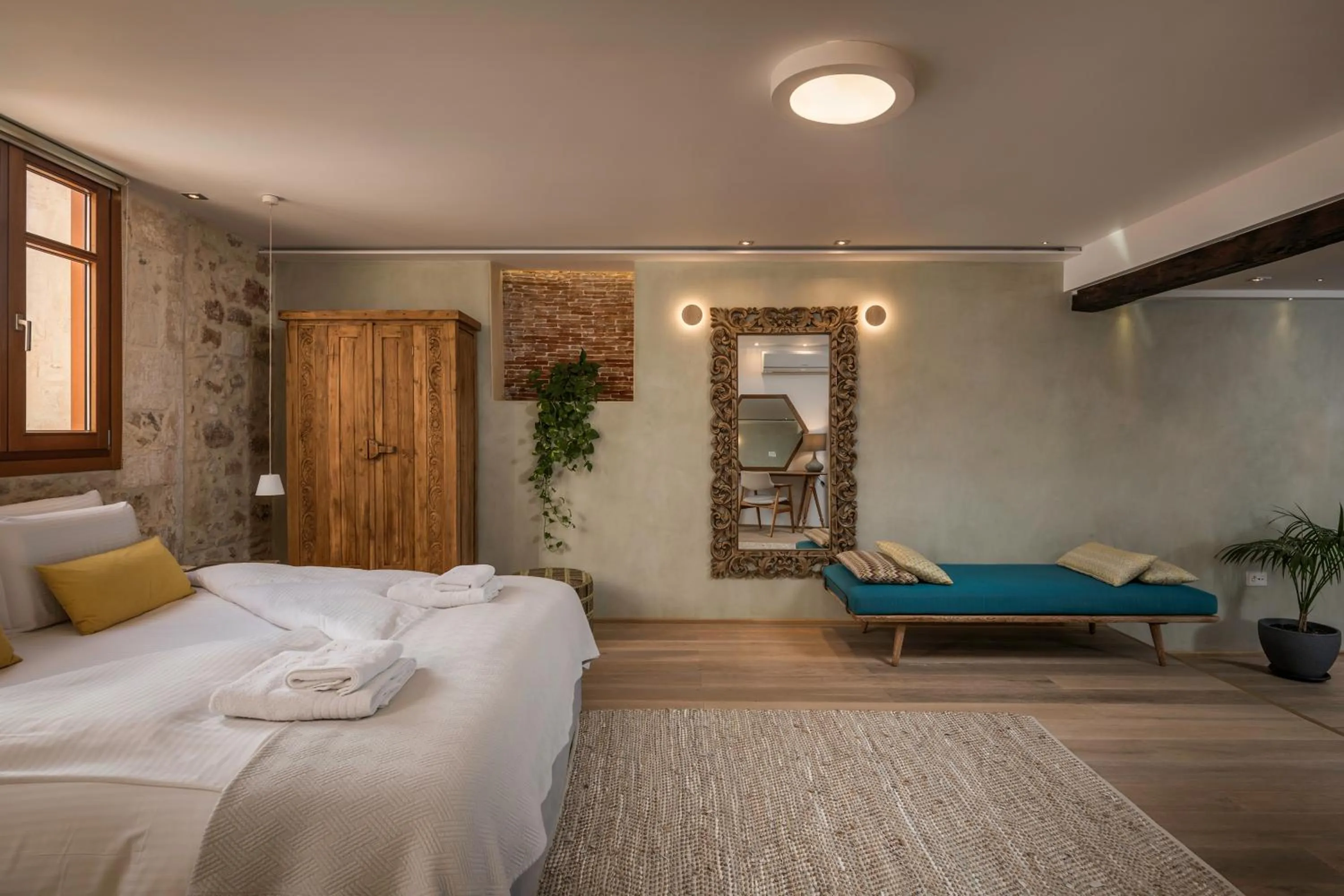 Bed in Residenza Vranas Boutique Hotel