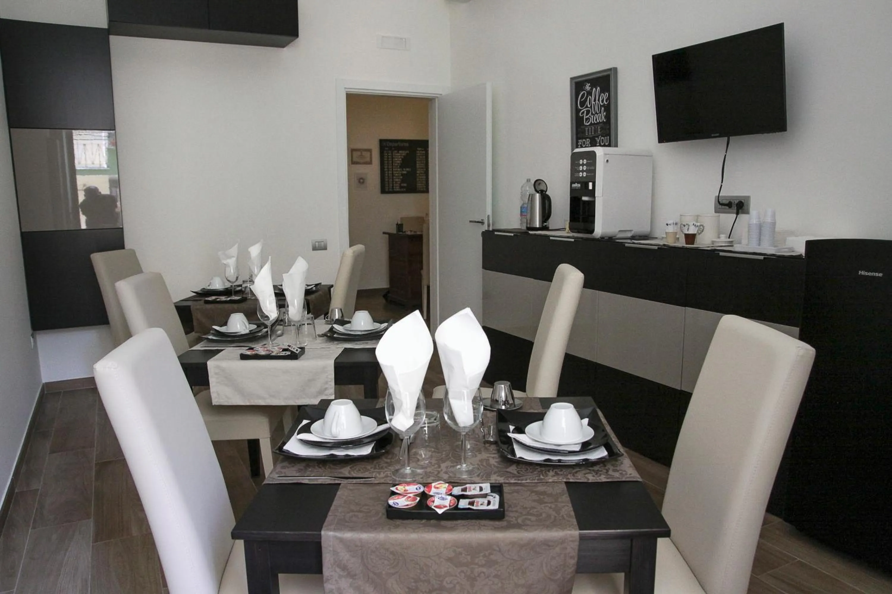 Communal lounge/ TV room in B&B Il Ritratto