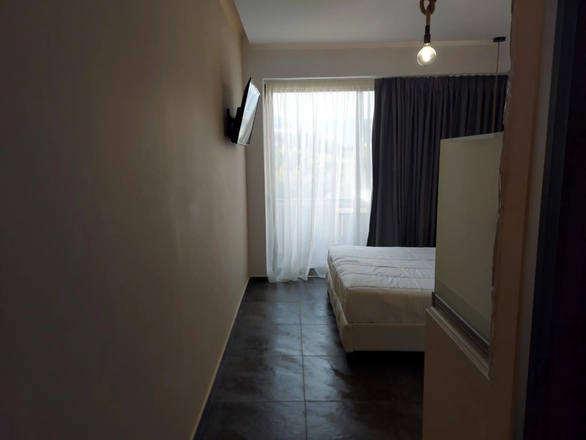 Photo of the whole room, Bed in The Santo George Beach Resort