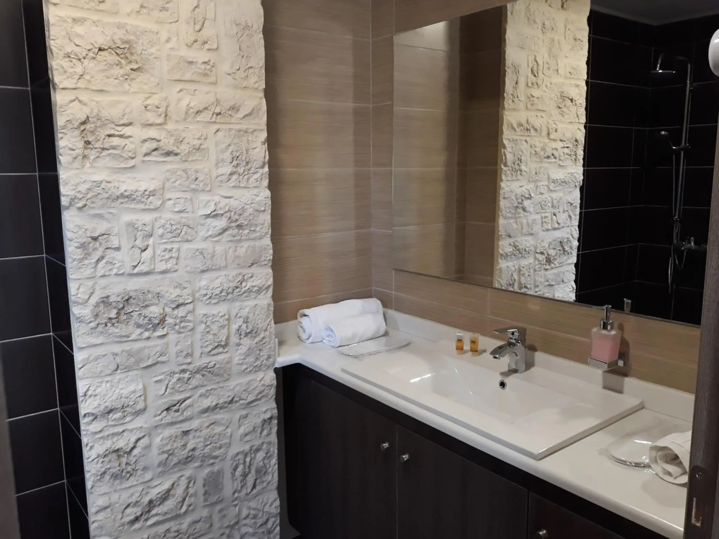 Bathroom in The Santo George Beach Resort Bathroom in The Santo George Beach Resort