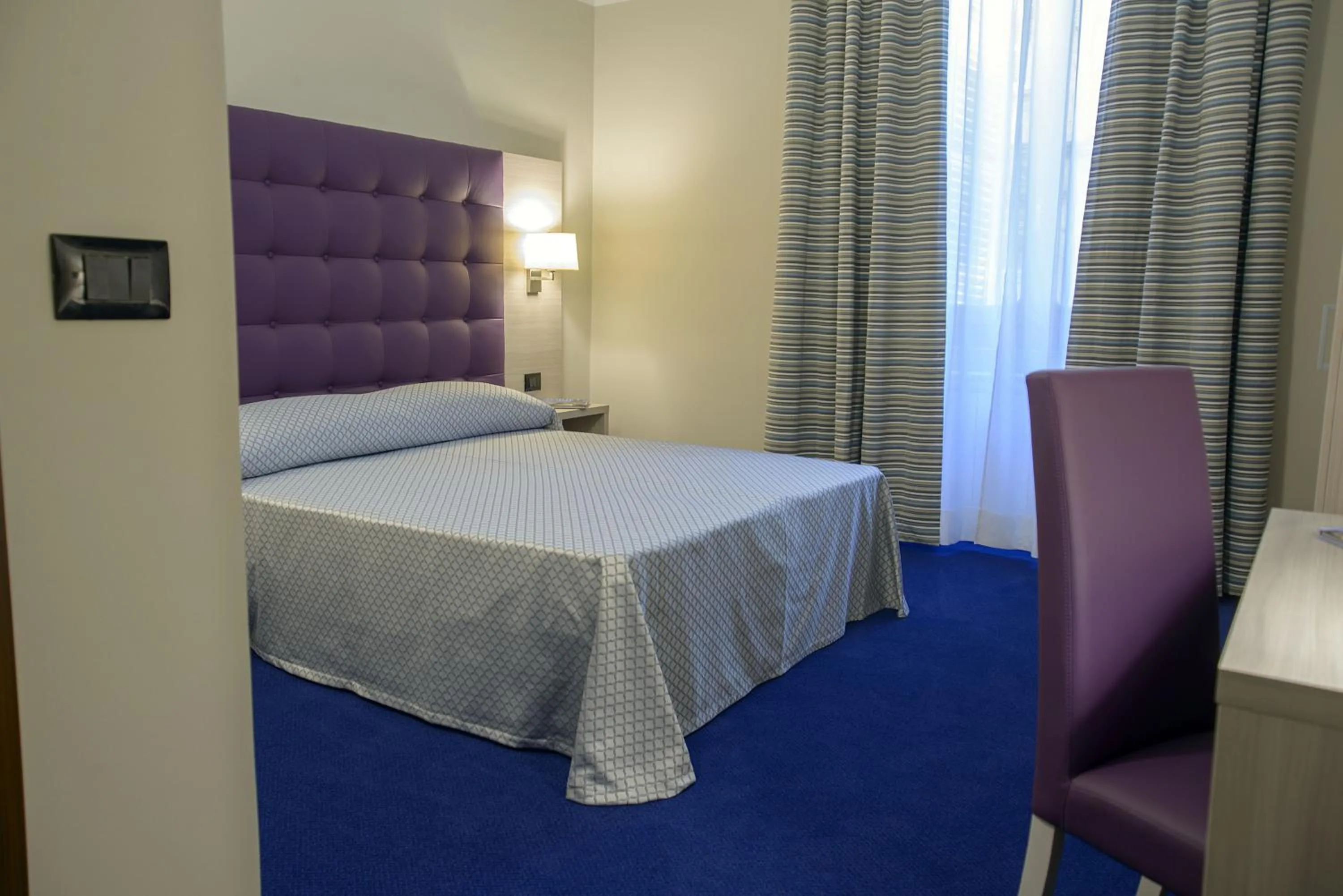 Photo of the whole room, Bed in Hotel Torino Porta Susa