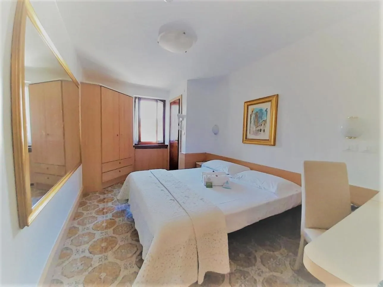 Photo of the whole room, Bed in Albergo Trento