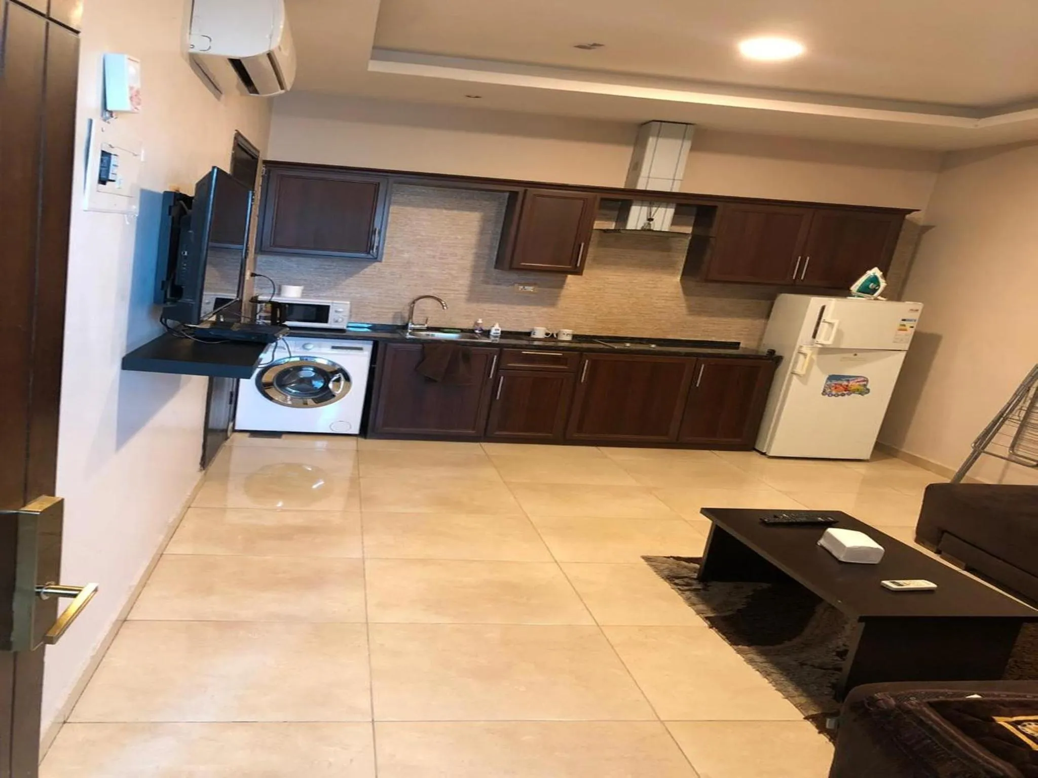 Kitchen or kitchenette in Panda Hotel Apartments