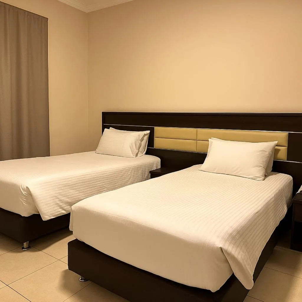 Bed in Panda Hotel Apartments