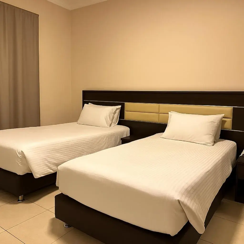 Bed in Panda Hotel Apartments Bed in Panda Hotel Apartments