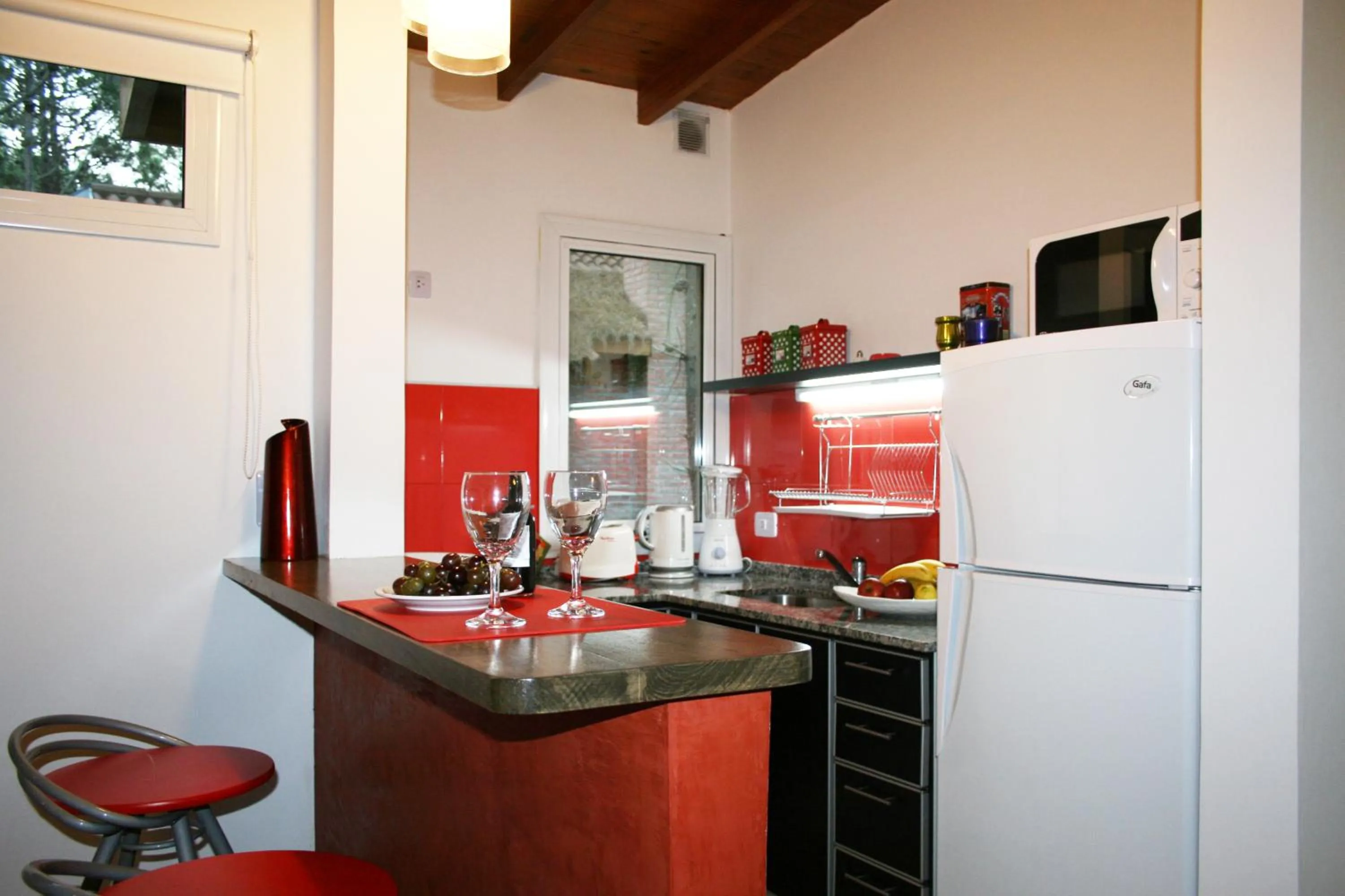 Kitchen or kitchenette in Kaia Apart y Spa
