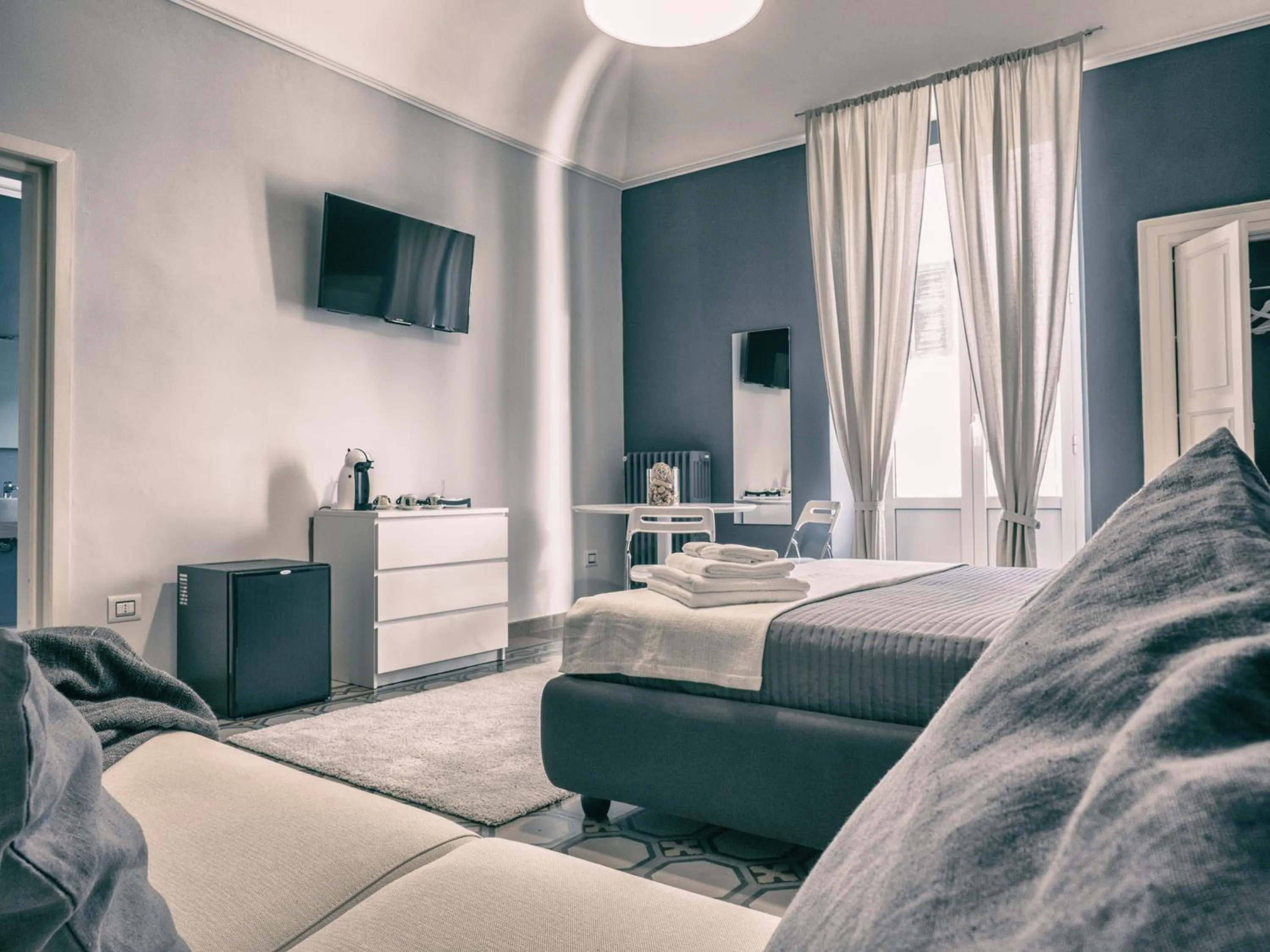 Bed in Ajde rooms & breakfast