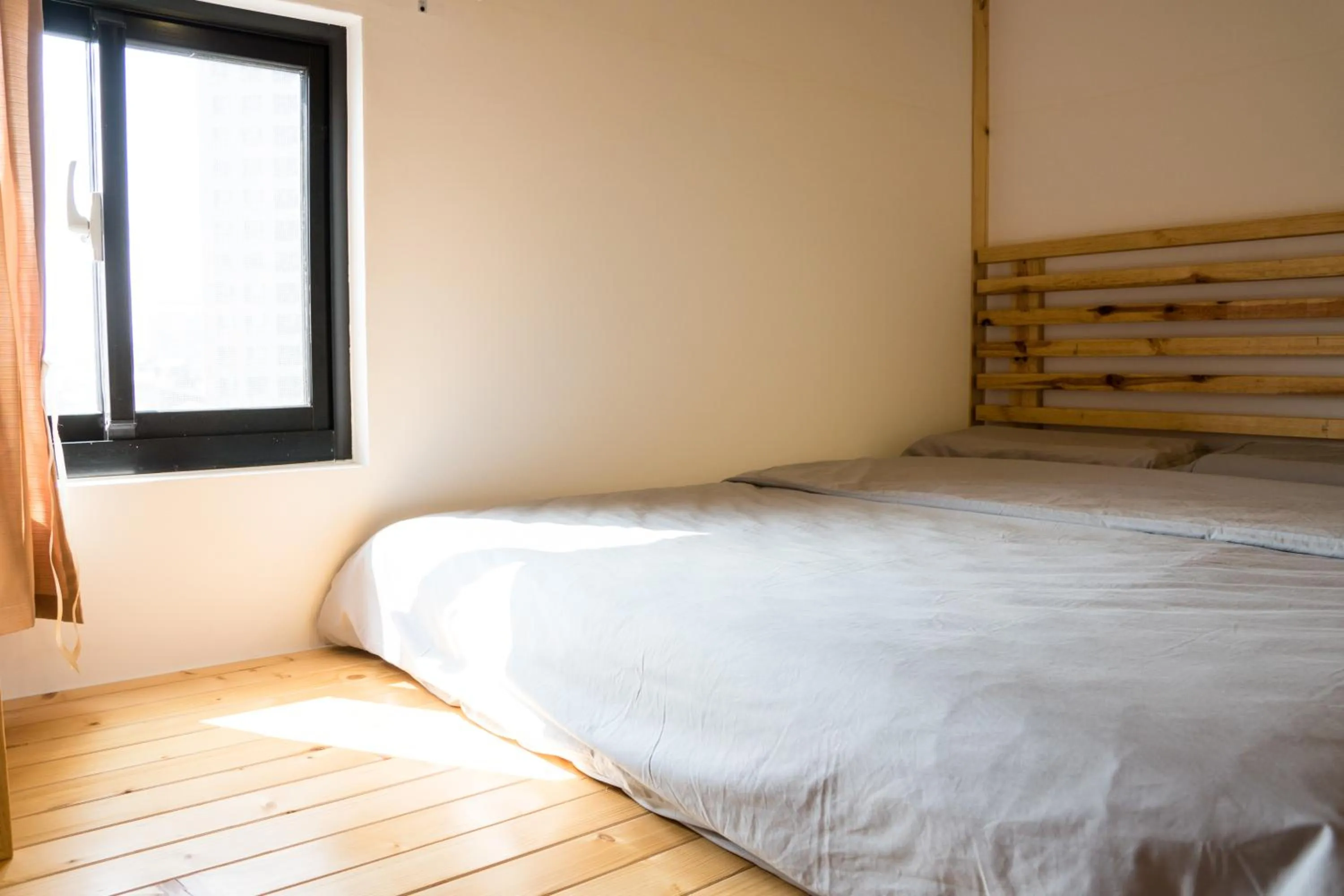 Bed in Loft Wo Design Inn