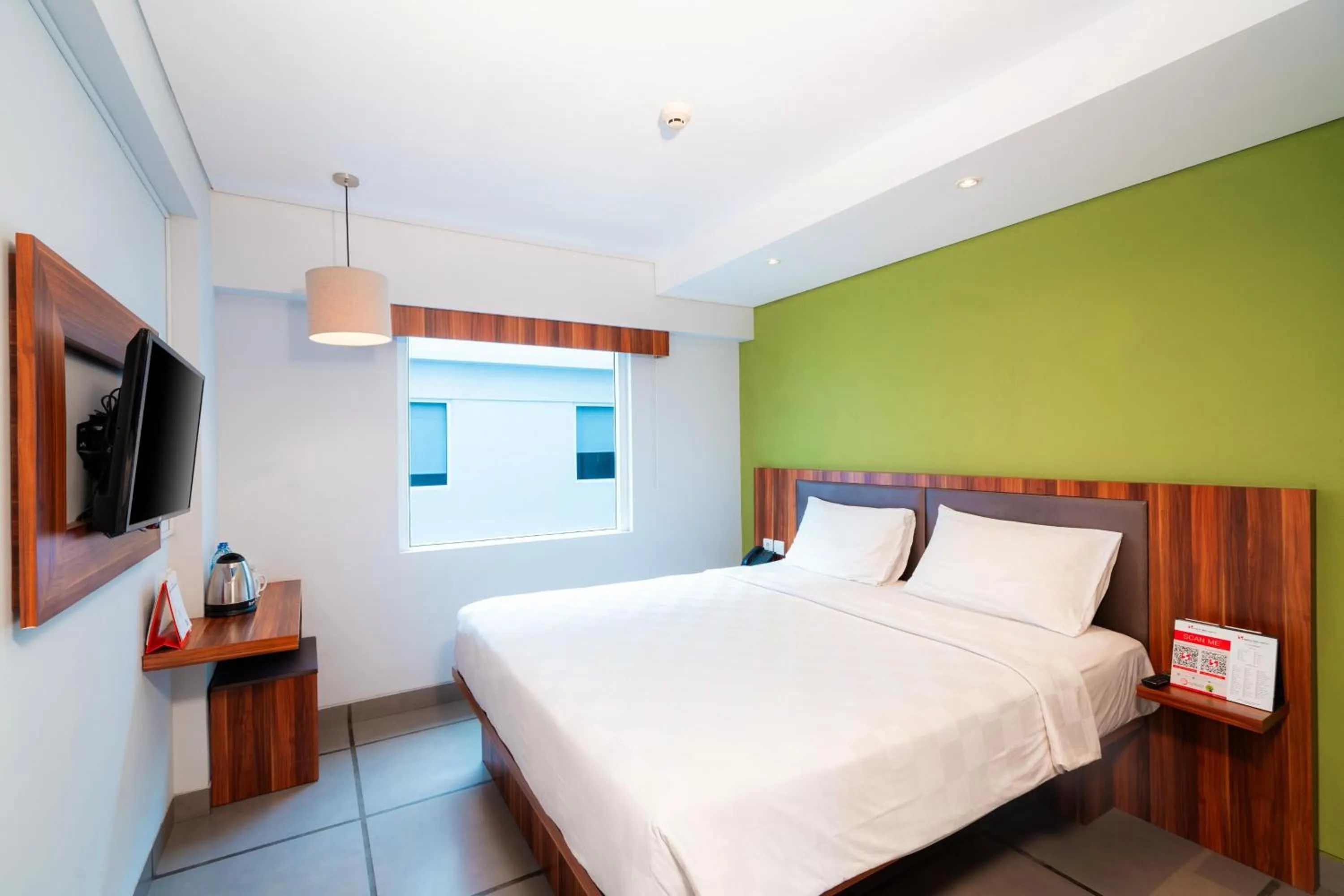 Bed in Swiss-Belexpress Kuta Legian