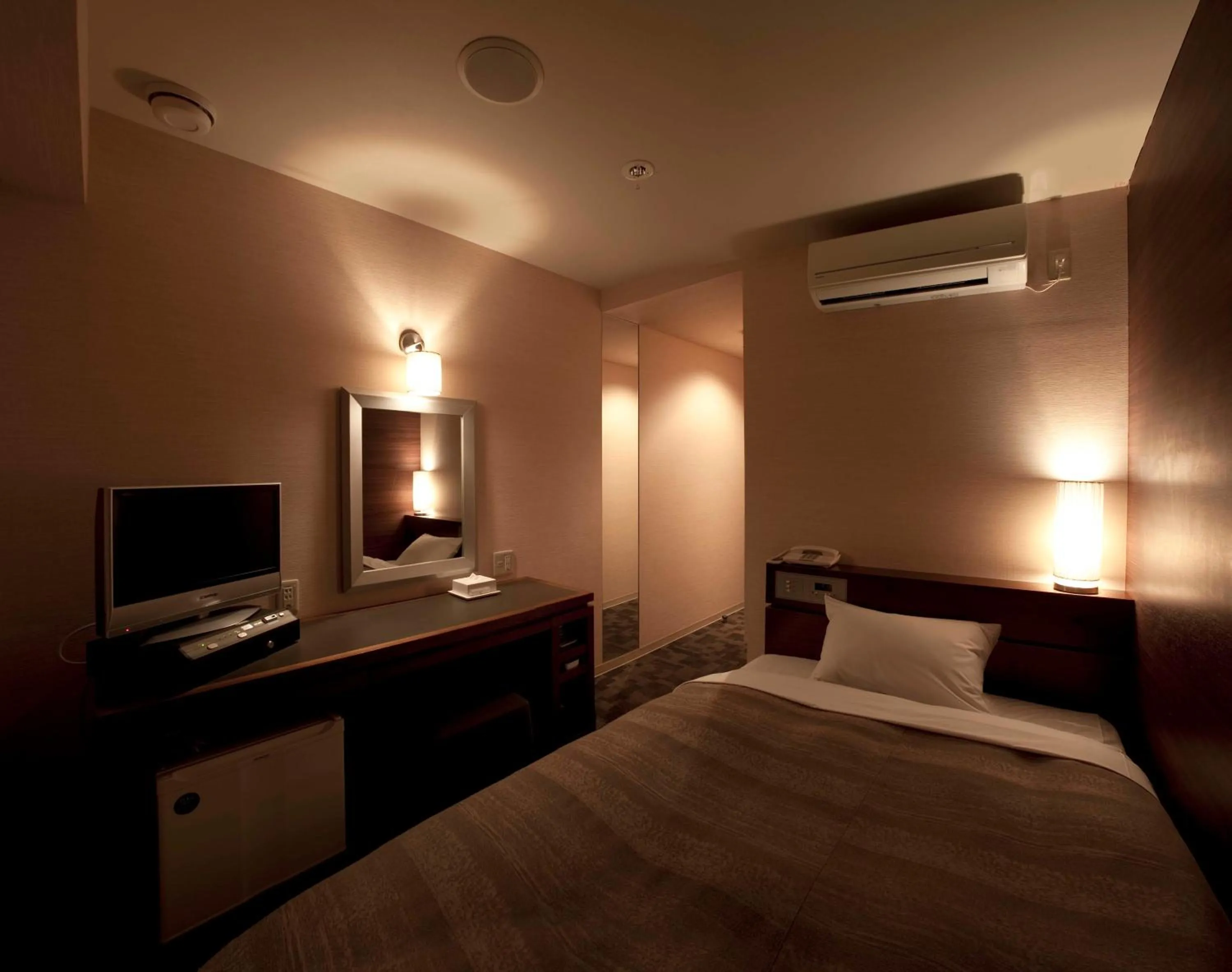 Photo of the whole room, Bed in Center Hotel Toyota