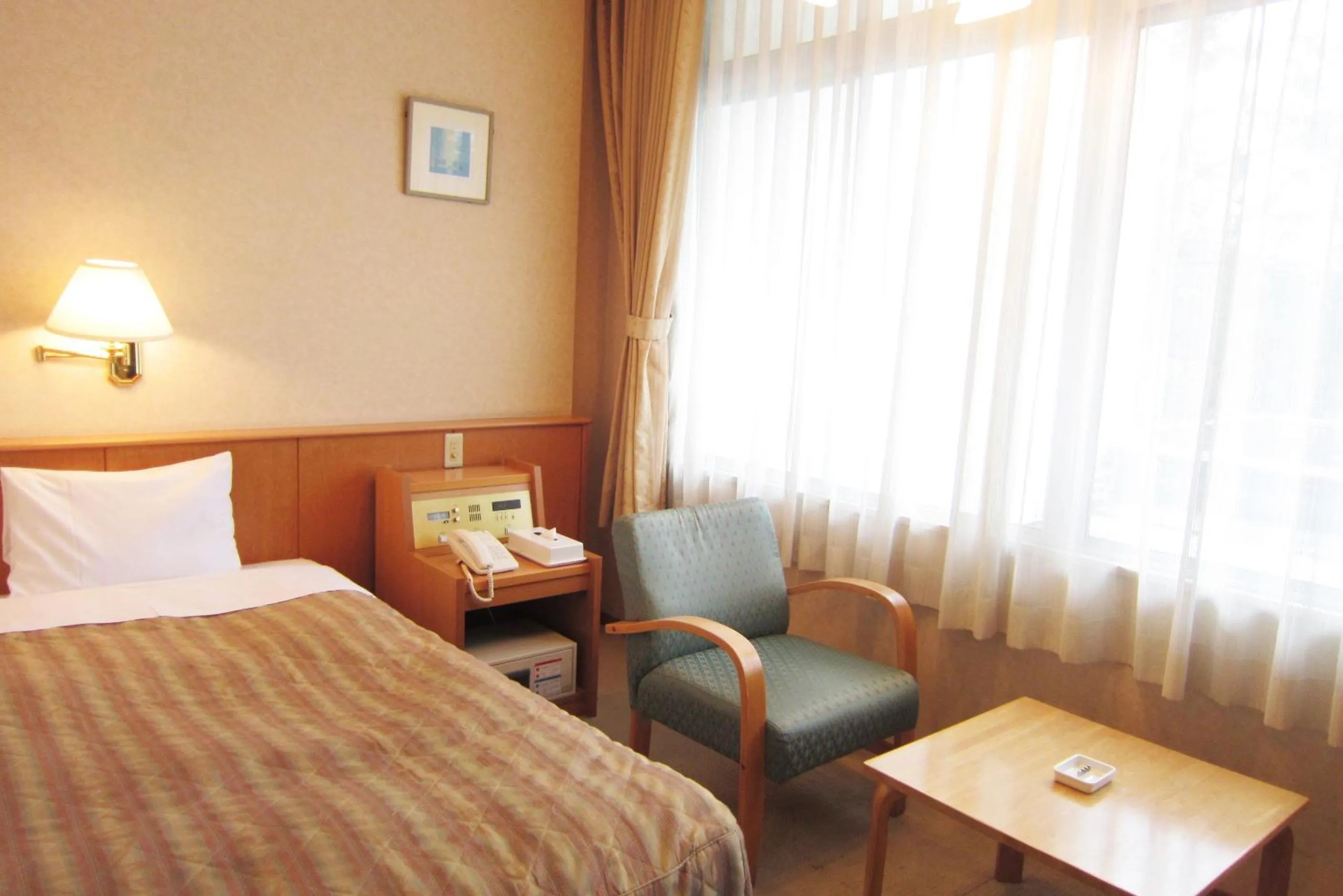 Photo of the whole room, Bed in Hotel Axia Kushikino