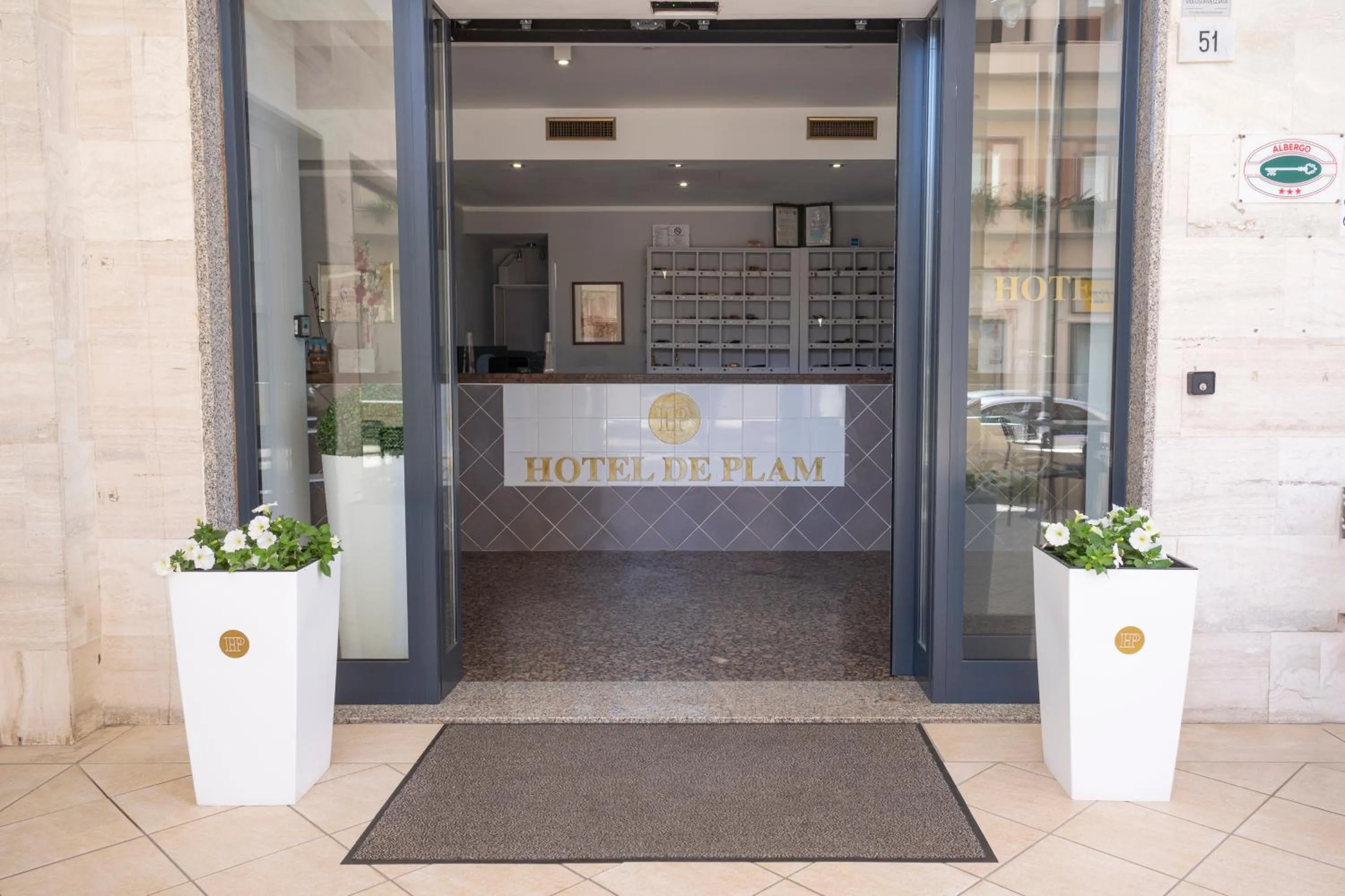 Lobby or reception in Hotel De Plam