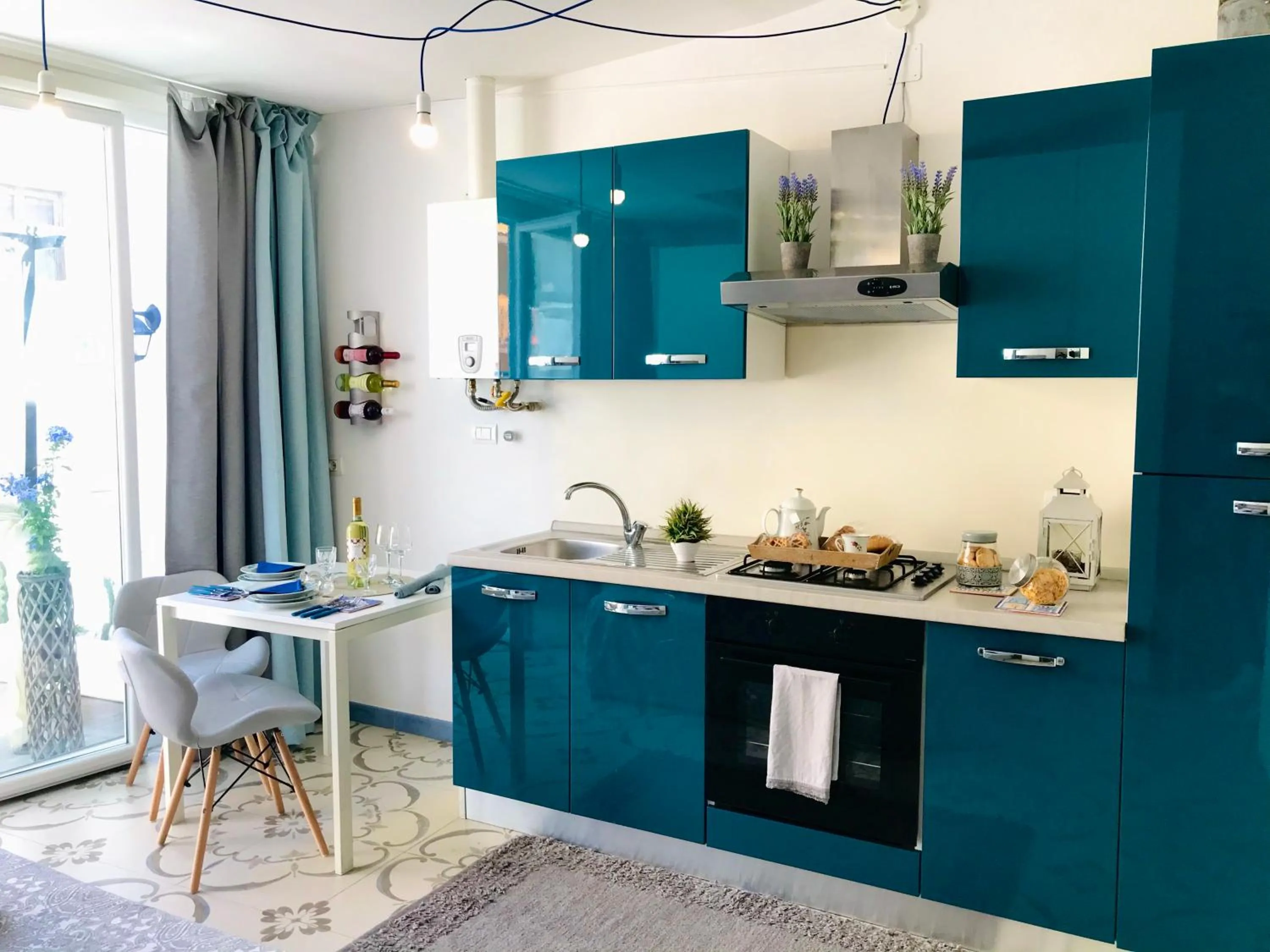 Kitchen or kitchenette in Le Statuine Dimore Diffuse