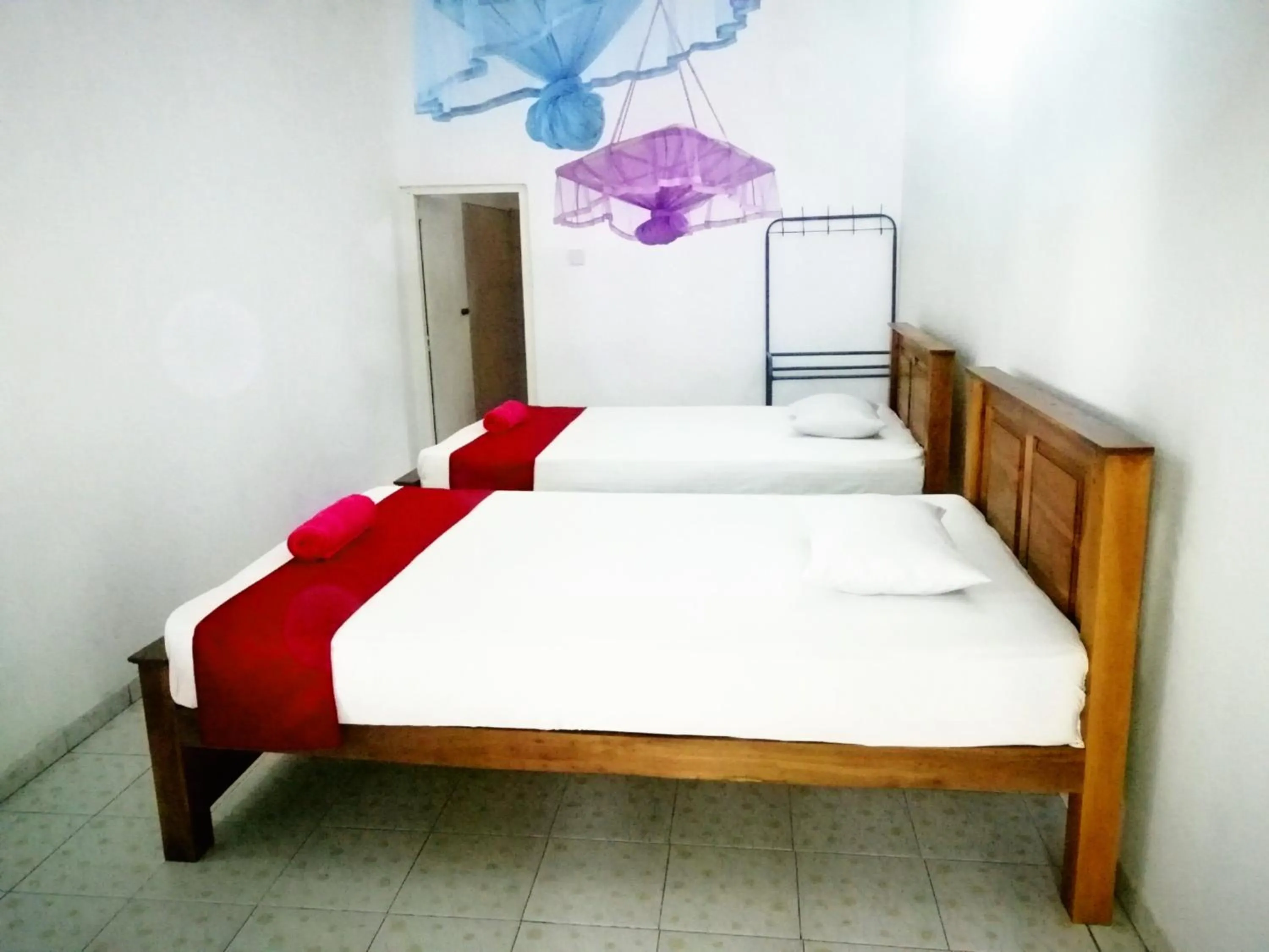 Photo of the whole room, Bed in Jayaru Guest House