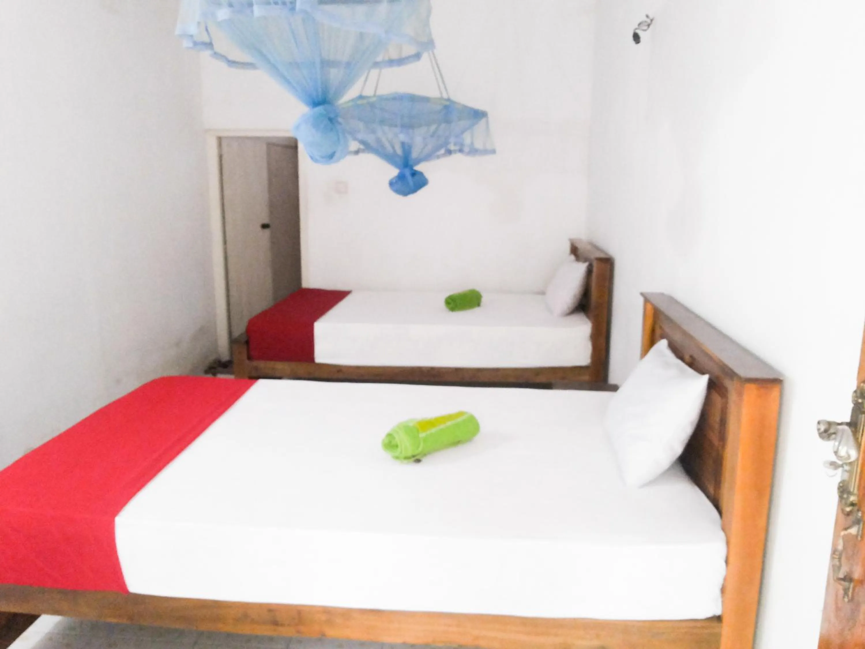 Photo of the whole room, Bed in Jayaru Guest House