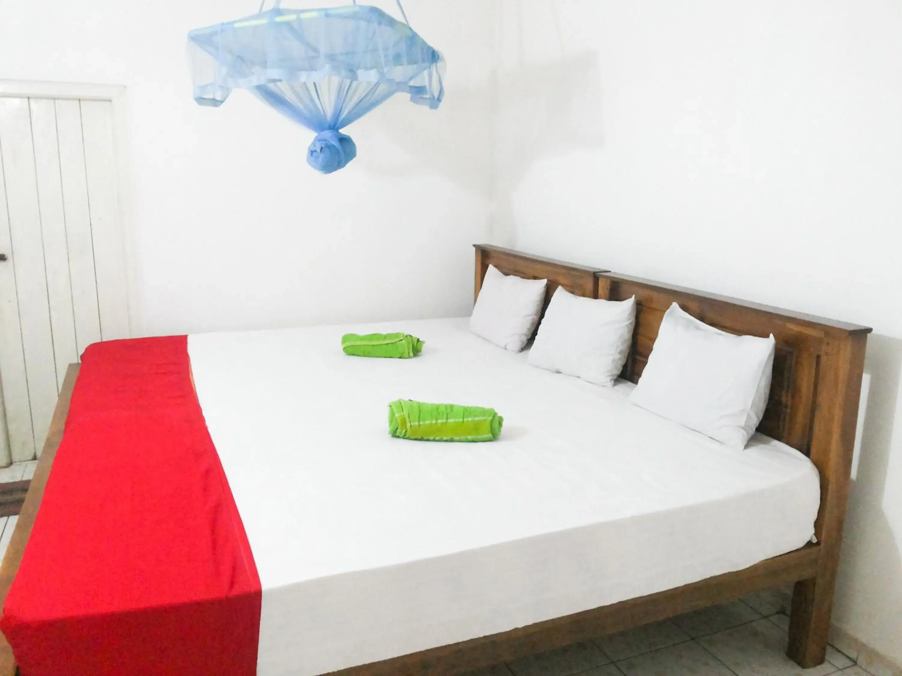 Triple Room with Garden View in Jayaru Guest House Triple Room with Garden View in Jayaru Guest House