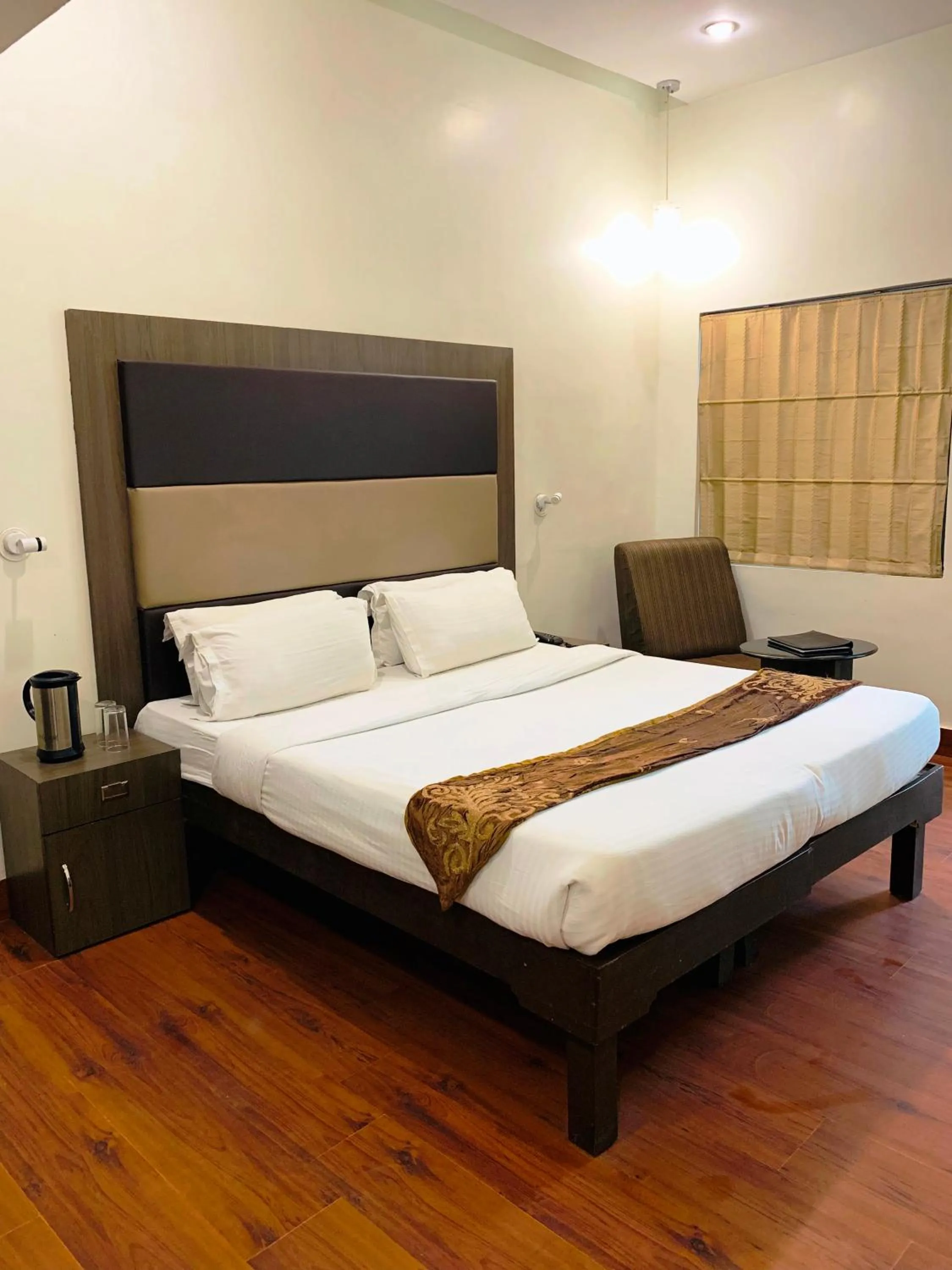 Bed in The Ambassador - Hotel & Conference Center