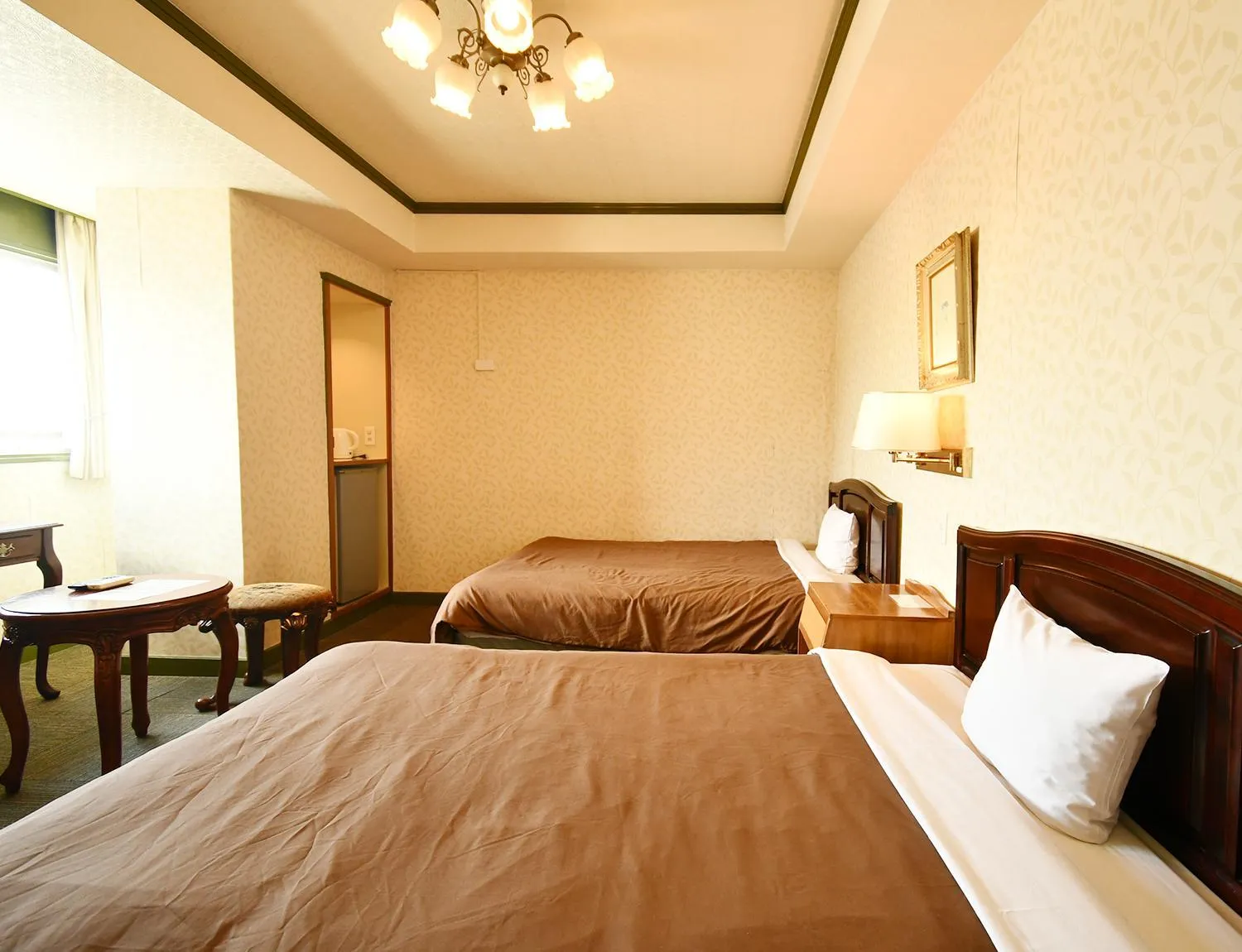 Bed in Sunrise Hotel Okinawa-どこか懐かしいレトロ宿軽朝食付