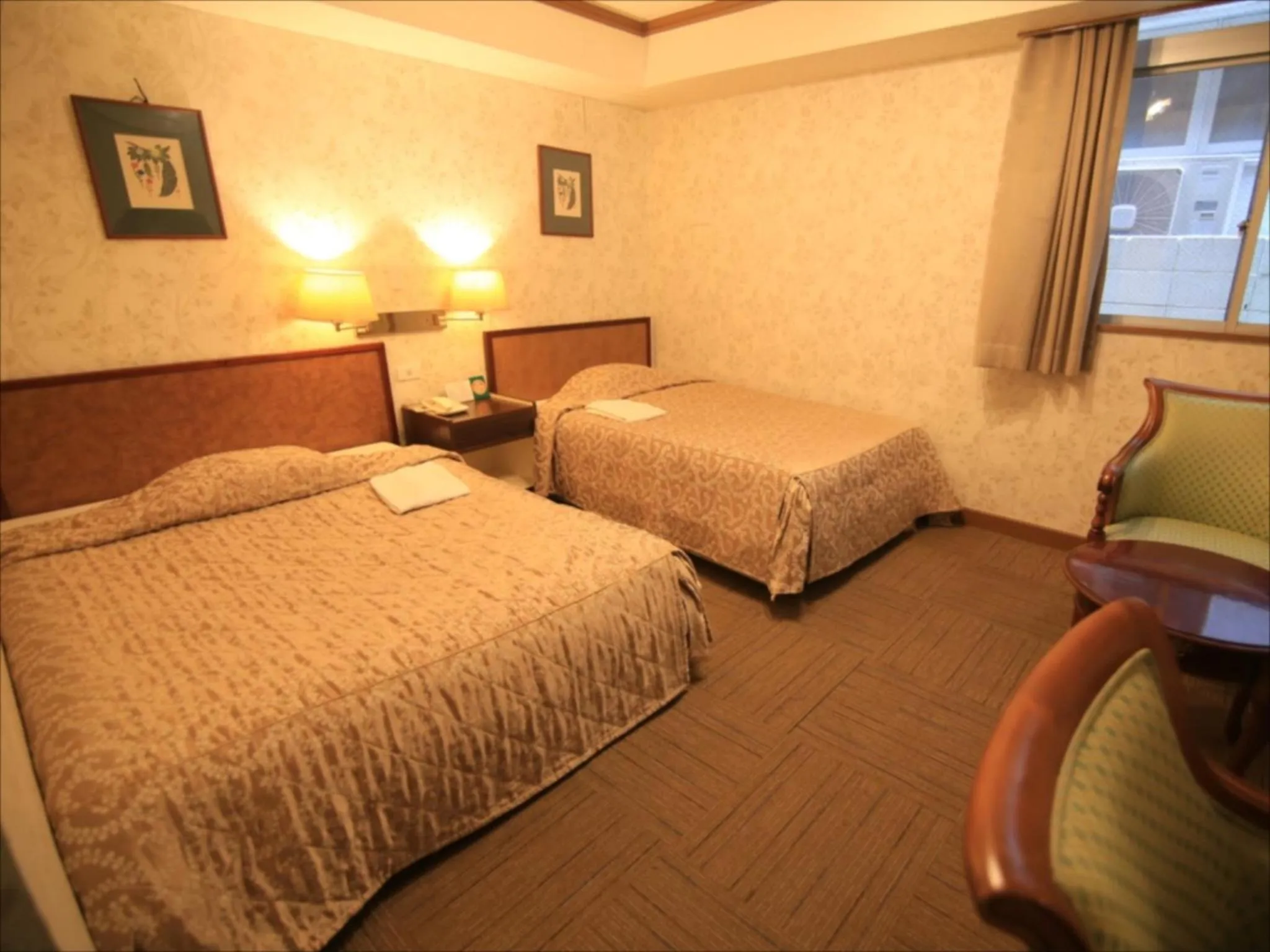 Photo of the whole room, Bed in Sunrise Hotel Okinawa-どこか懐かしいレトロ宿軽朝食付