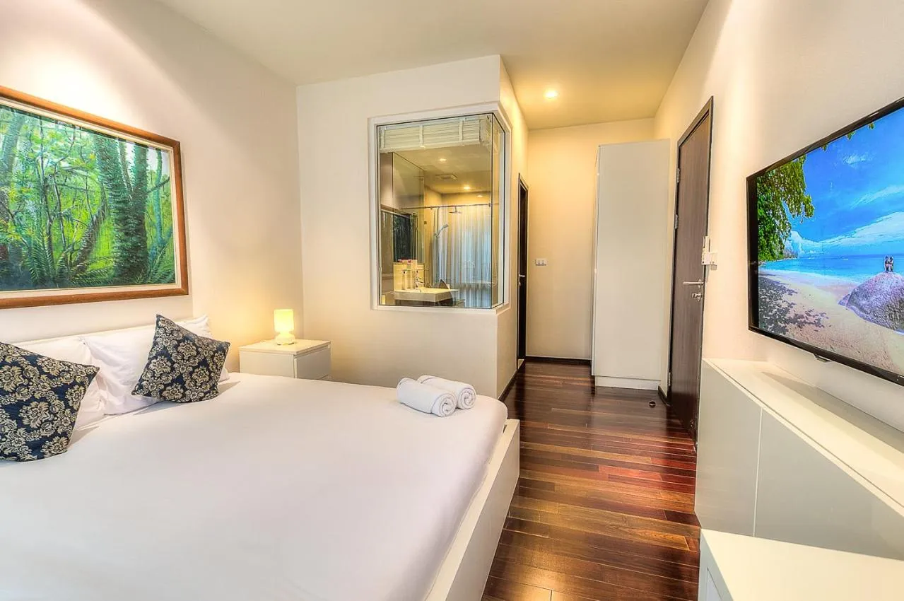 Photo of the whole room, Bed in The Title Comfort Condotel